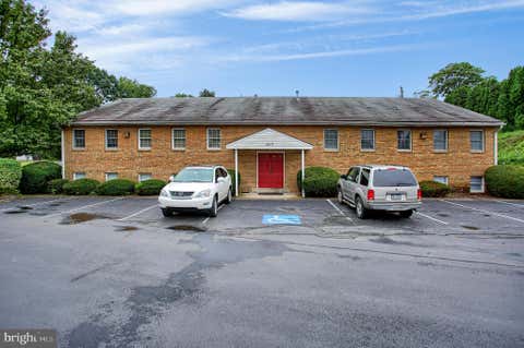 Photo of 1517 Cedar Cliff Drive #105, CAMP HILL, PA 17011 (MLS # PACB2057892)