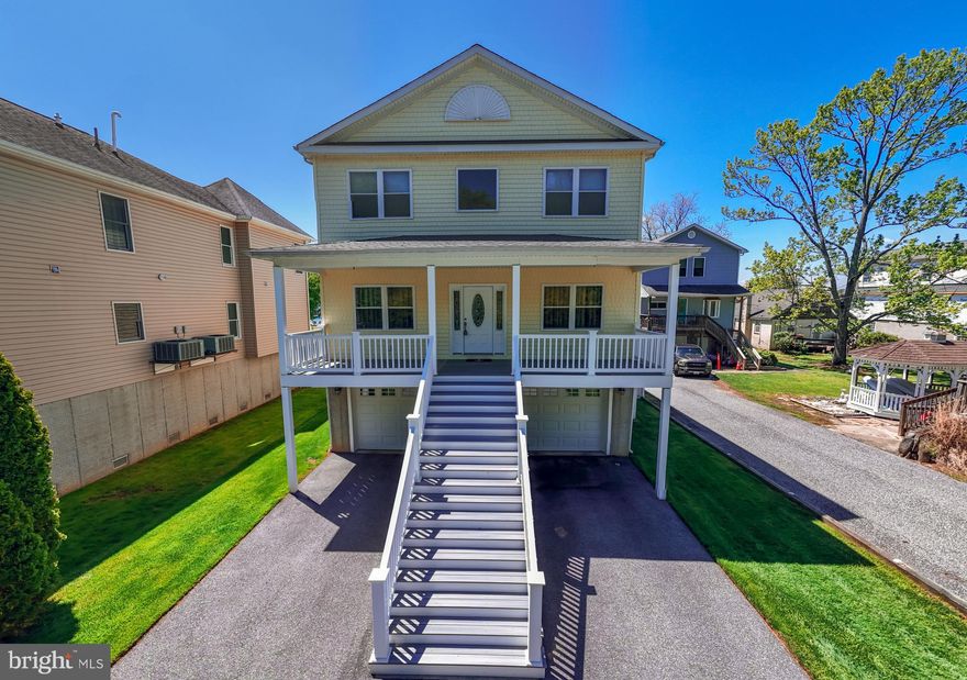Welcome to 1234 Burke Rd, where elegance and sophistication meet coastal charm. This stunning 4-bedroom, 2 full bath, and 2 half bath waterfront home is finished with high-end design details throughout and is truly a coastal masterpiece. Step inside to a grand open foyer and an inviting open floor plan featuring a chef’s dream kitchen with JennAir appliances, granite countertops, a spacious pantry, and a coffee bar. The home also offers a formal dining room and was thoughtfully built with the option to add an elevator if desired.  Enjoy incredible waterfront living with a huge 175-ft pier complete with water, electric, a 10,000-lb boat lift, a 2,800-lb small lift, and excellent water depth. The expansive screened-in waterfront deck provides the perfect additional living and entertaining space.  The ground-level area is a must-see for the savvy entertainer, offering a walkout to a covered travertine patio. Additional features include a 3-year-old HVAC system, a tankless water heater, beautiful landscaping, and a move-in-ready setting designed for effortless waterfront enjoyment. Nothing to do but buy, relax, and start making endless memories on the water.