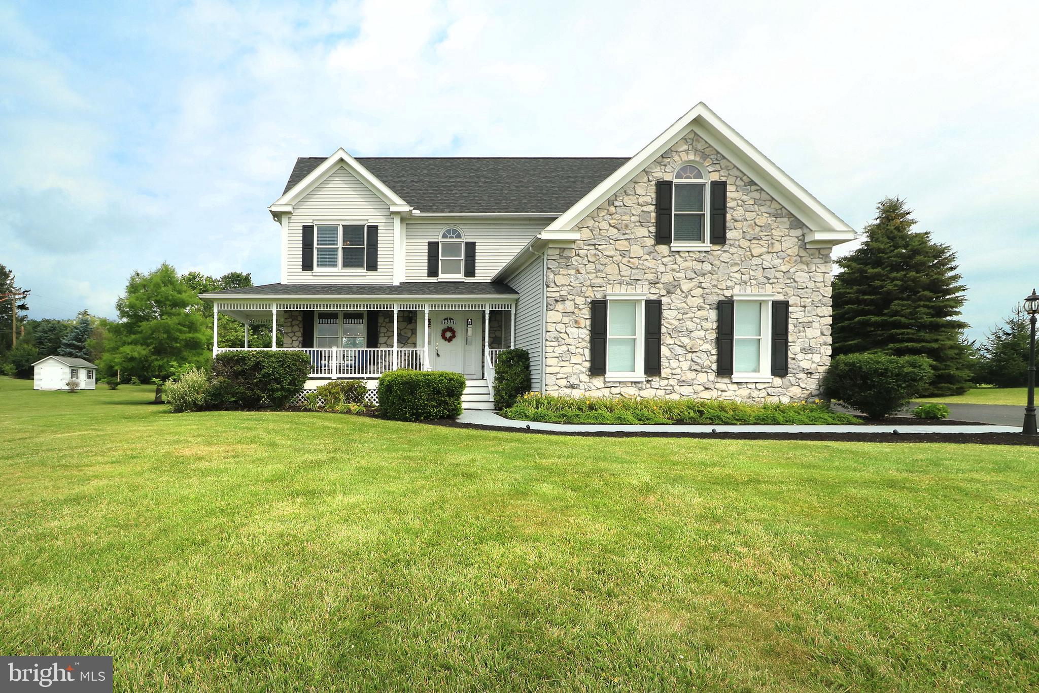 Pastoral and picturesque encapsulate the stunning views and charming vibes of 109 Summit Drive, Centre Hall. You'll love the home sweet home feel of this Penns Valley beauty with 360 degree views of the mountains and valleys. Nestled on a 3 acre lot, this 4b/3.5 bath two story home that has been lovingly maintained and features many lovely updates. From the moment you enter you'll be greeted by the serene color palette and beautiful two-story foyer with tile floors featuring a new wrought iron bannister and runner on the beautiful staircase, perfect for prom dresses. You'll love having space to host friends and loved ones in the lovely formal living room and dining room where you'll share holiday memories for years to come. The heart of the home, you'll enjoy the nicely sized eat-in kitchen with lovely wood cabinetry, tile backsplash, hardwood floors, breakfast area with bay window, peninsula great for baking projects, corian countertops, newer SS appliances, Bosch refrigerator, five burner gas range with griddle, and pantry closet. The open concept leads to a beautiful family room with new stone surround and live edge mantle on the gas insert fireplace, wall of windows, and door to the beautiful two level back composite deck overlooking the wonderful backyard. You'll appreciate having a first floor powder room with pedestal sink for guests. Upstairs you'll discover plush carpeting, wonderful views from the front windows, and a peaceful primary suite with two walk-in closets and a vintage but pristine private bath with jetted tub, glass door shower, and double vanity, ready for the next owner's updates. Three additional bedrooms including a large over the garage bedroom with cool angled ceilings, a nice hall bath with tub/shower & new LVT floors, and an all new laundry room with LVT floors, new cabinets, wainscoting, utility sink, and creative hanging bar complete the upper level. The finished lower level features a stylish family and rec room with laminate floors, walk-up door, pool table with optional ping pong top, a bonus room great for guests or an office, full bath, and unfinished storage and utility area. You'll love the beautiful 3 acre yard with fruit trees, raised bed vegetable garden, beautiful fire pit, smoker area, and lovely perennial plantings; there is so much to love inside and out! With a beautiful and quick commute to State College/Campus you'll love the fusion of country living with the easy access to town! And with new carpet, newer HVAC, fresh lovely paint colors, many new light fixtures, and all of the previously mentioned updates this home is ready to welcome you home.