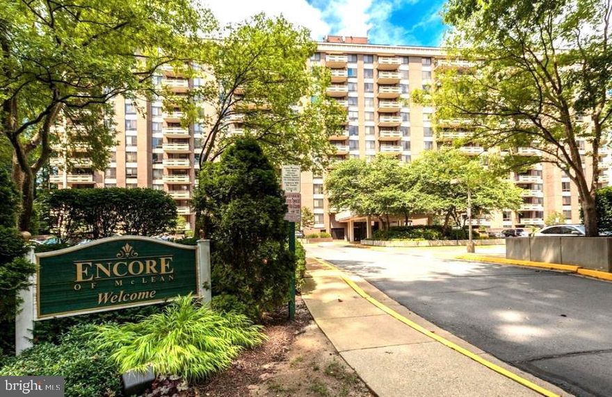 The Encore - Fantastic, gated condo community in the heart of Tysons. Ideal floor plan with 2 bedrooms, each with a walk-in closet, and 2 full bathrooms. Newer (1 yr old) carpet in both bedrooms and newer (1 yr old) luxury vinyl flooring in the living room. Enjoy the spacious balcony that backs up to trees for a wonderful green space view in the middle of Tysons. The condo includes an in-unit washer/dryer for your convenience. Added bonus that it has 2 assigned parking spaces as well as an additional secure storage area. The building amenities include 24-hour concierge service, 3 outdoor pools, fitness center, library, and a social room. If you desire a bit more than the fitness center offers there is a OneLife Fitness right next door! Ideal location for a commuter with quick easy access to Route 123, I-495, I-66, Route 7 and the Dulles Toll Road. With the McLean Metro station less than a mile away the location can't be beat. For those that like to enjoy the shopping, dining, entertainment options of Tysons, the Pedestrian/Bicycle bridge provides quick/easy access from Old Meadow to The Tysons Mall. Conveniently located near the Capital One Center for dining and entertainment options as well!