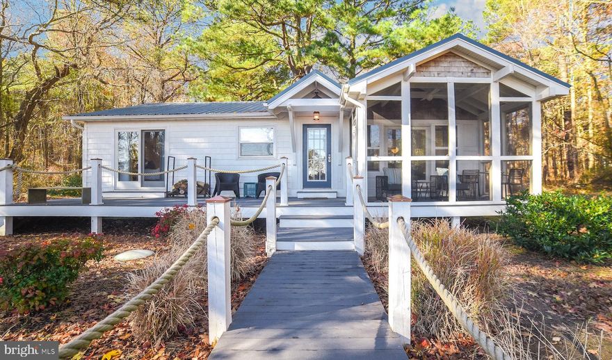 Chesabelle is our Belle of the Bay.  This fully renovated beach house is stylishly appointed with stunning views across a small estuary into the Bay.  The house features an open floor plan for easy entertaining. See diverse wildlife including, herons, swans, ospreys, bald eagles, and pelicans as you cook, read, or relax on the screened-in porch. Back in the house, the open floor plan, complete with an open kitchen, dining room, and sitting room with porch + deck allows a family or group to be together whether cooking, playing games, watching television or just relaxing.  The wood burning stove makes winter days at Chesabelle as enticing as summer days.  When the day is done relax with a good book in your claw foot tub.Enjoy a weekend wine tasting at nearby Woodlawn plantation.A short bike ride away is Point Lookout State Park, a Civil War site.  Today the park, which is located on the point where the Chesapeake Bay and the Potomac River meet, hosts miles of protected land set aside for biking, kayaking, boating, fishing, camping or enjoying nature as well as a museum that provides a historical perspective on the region.  Or charter a boat at one of many local marinas for a day of fishing on the Bay. Another nearby historical site is St. Mary's City (10 miles), the original capital of Maryland. Visitors are 25 minutes from dining and shopping on Solomon's Island or in historic Leonardtown.  Or enjoy one of several local marina restaurants.  Collect shells and beach glass while walking uninterrupted for miles along the sandy beach.  Unlike typical cheek-by-jowl beach houses, Chesabelle offers its visitors direct Bay views while nestled on a 1/2 acre of land.  Enjoy rare, unimpeded  waterview privacy and access so close to major cities and amenities.
