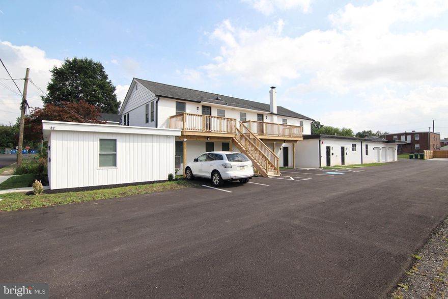 Unlock the potential of this 5-unit multi-family property, rebuilt in 2023. A prime addition to any investment portfolio! Strategically located just one block from S. Broad Street, this property offers strong rental income with modern finishes and low-maintenance upgrades throughout. The building features three spacious 2-bedroom, 2-bathroom units on the first floor and two well-designed 2-bedroom, 1-bathroom units on the second floor—all fully updated with contemporary interiors. Each unit includes central air, heating, luxury vinyl plank flooring, quartz countertops, stainless steel appliances, recessed lighting, and modern tile work in the bathrooms. Adding to the value, the property comes with five garage bays—an in-demand feature for tenants that also offers extra potential rental income. The on-site laundry facility enhances convenience, while the desirable Lansdale location provides easy access to shopping, dining, parks, and major transit routes—including SEPTA’s Doylestown/Lansdale line for direct city access. With all renovations complete and a strong local rental market with gross rents of $128,940, this turnkey property is ready to generate immediate cash flow. Don’t miss this rare investment opportunity—schedule a showing today!