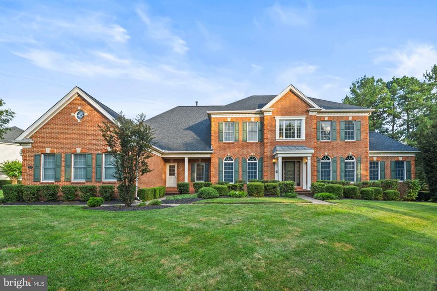 Welcome home to 15061 Doral Pl in the sought after Dominion Valley County Club! Step into luxury living with this meticulously designed residence, where every detail has been carefully curated for comfort, style, and functionality.  This stunning home boasts 3 finished levels, 4 bedrooms, 5.5 bathrooms and an oversized 3 car garage.  Perfectly situated on the .6 acre corner lot, this home will have you in awe from the moment you drive up.  From the moment you arrive, the manicured lawn and landscaping make a lasting first impression, reflecting the care and attention given to every inch of this property.  Step inside and the two story foyer greets you along with the beautiful hardwood floors that span through most of the main level and hallway of the upper level. Every room in this home is generously sized and filled with natural light, thanks to expansive picture windows that frame beautiful outdoor views.   The gourmet kitchen is a chef's dream with Bosch appliances, the expansive center island with room for chairs, double wall oven and 6 burner cooktop.  The attention to detail shines throughout the home, with custom paint and beautifully installed shadow boxes, chair rail, and crown molding creating a high-end, polished aesthetic.  With an expansive layout, the main level includes multiple living areas—kitchen, office/den, living and dining rooms, and a grand family room with a gas fireplace—plus a bright sunroom that’s off the living room, perfect for relaxing or enjoying morning coffee year-round.  The upper level features generously sized bedrooms, each with large closets and the added convenience of en-suite bathrooms. The luxurious primary suite is a true retreat, boasting a high tray ceiling, an expansive walk-in closet, the sitting room, and a spa-inspired en-suite bath complete with a jetted soaking tub, separate stand-up shower, and dual vanities. The basement is tastefully finished and thoughtfully designed for both entertainment and style. Luxury vinyl plank flooring adds a sleek, modern touch to the bar area, while ceramic tile enhances the “pool table and poker areas”. The home gym is outfitted with durable rubber mat flooring—perfect for workouts and fitness routines.  There is also plenty of storage space as well.  The rec room area is the perfect place for watching movies or entertaining with the modern fireplace wall as a beautiful focal point. Out back, you’ll find a generously sized deck and a lovely gazebo—perfect for enjoying peaceful mornings, entertaining guests, or soaking in the beauty of fall and spring days.  This beautiful home was crafted for the most discerning homeowners seeking both beauty and functionality.  Many updates to mention too including basement finished in 2018, roof replaced 2020, water heater replaced 2025, kitchen appliances 2021, deck and gazebo 2009, sump pump/backup battery, upgraded closet in master bedroom, desk in kitchen added, desk in office added, laundry room upgrade (cabinets, sink, clothes hamper, hanging system). TV unit in master sitting area, Surround Sound Savant system with ceiling speakers in basement, glass shower enclosure in primary bathroom, Universal Draft Inducer Assembly replaced 2024, Digital Non Programmable Thermostat installed 2024, All MFD 370V Dual Run Capacitors replaced 2025 (Chemically cleaned Condensing Unit Coil)  Mortgage savings may be available for buyers of this listing.