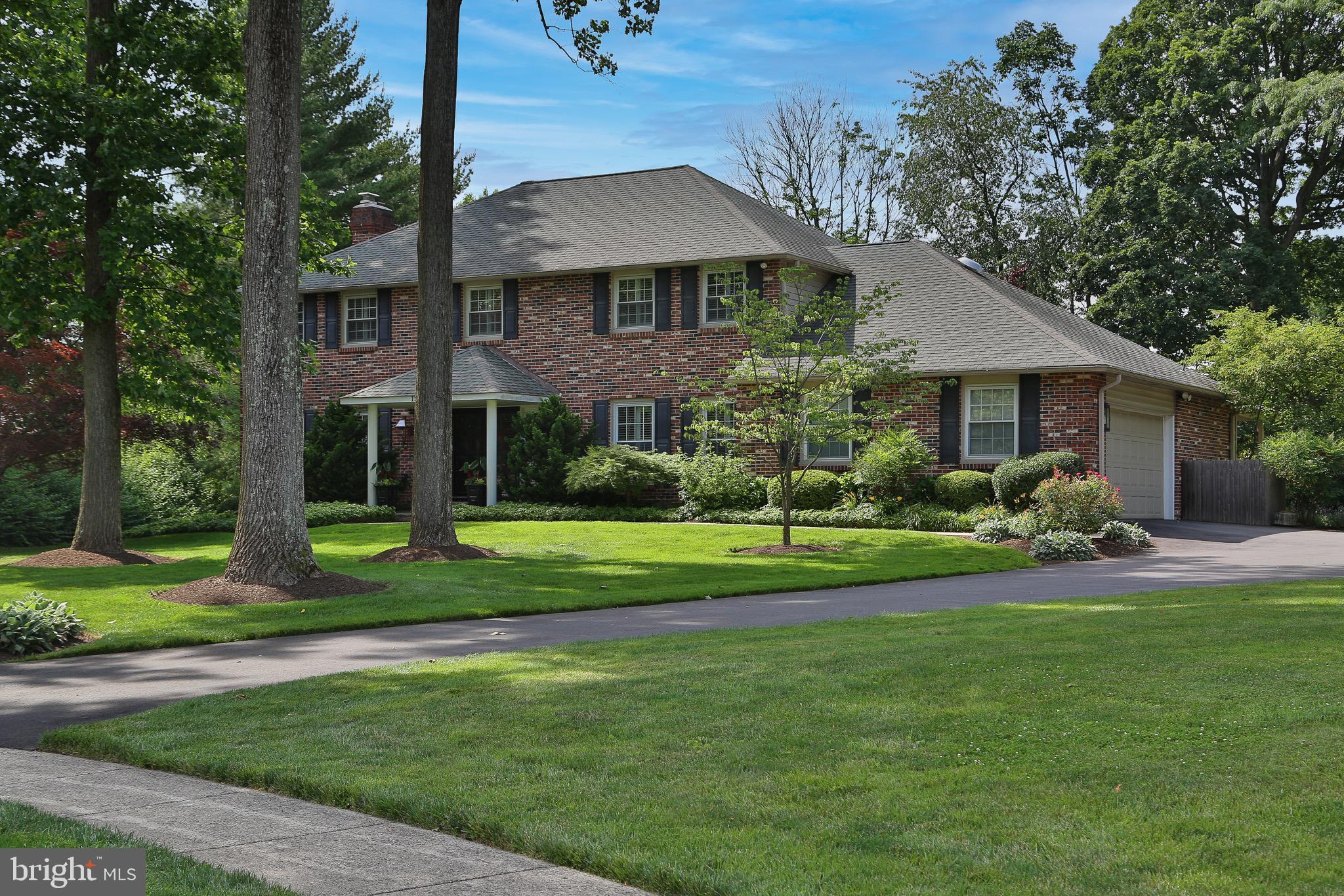 Wow is the best way to describe this one of a kind, amazingly updated and beautiful colonial home with NO STUCCO located on a quiet cul-de-sac in the desirable Executive Estates.  Four bedrooms, 2 and half baths, on a gorgeous private lot, this house has all the upgrades a buyer would want!  Enter through the double doors into the open foyer with a marble floor and a glamorous curved staircase. The foyer flows right into the large family room, with newly finished hardwood floors, and a gas fireplace.  Creating the perfect entertaining area, the family room also contains a beautifully unique custom built-in wet bar with quartz countertops, custom lighted shelving, plenty of storage, top of the line built-in ice maker and beverage center, and a hammered stainless sink with a brass inlay and elegant faucet.  Connected to the family room is the fabulous large dining room exposing gleaming hardwood floors, custom molding all around, a closet custom built for storage, and a slider to guide you to the private beautifully landscaped back yard.  The gourmet, newly renovated kitchen is a dream kitchen offering a large island, a built in gas stove stop, microwave, steamer, sub zero built in freezer, sub zero built in refrigerator, as well as double Decor ovens.  A pantry, a wet bar, abundant cabinetry, and plenty of space for a table underneath a large skylight complete this stunning kitchen.  The slider in the kitchen leads you out to the covered patio that overlooks the large, flat private back yard.  Not to be forgotten on the first floor is the cozy den off the kitchen, a half bath, and the laundry room/mudroom providing access to the two car finished garage with an organization system and custom floor.  Upstairs, hardwood floors flow through the hallways containing custom built in linen closets, and lead you to the main bedroom where custom built in closets line the wall.  The bathroom leads to an additional walk in closet space that opens up to the luxurious bathroom to find a jetted tub, a stall tiled shower, a private water-closet and radiant heated floors.  Another updated full bath plus three additional generously sized bedrooms, two of which have walk in custom designed closets, complete the second floor.  The basement is an ideal complement to the rest of this fantastic house, with built-in organizational systems for art supplies and games, custom space for a gym, and a private office with plenty of built in bookshelves.  The unfinished areas of the basement include significant custom shelving and closet space.  This Upper Dublin gem boasts plantation shutters on almost every window, FULL HOUSE GENERATOR, custom molding throughout, and plenty of custom fitted closet space for storage, a recently renovated kitchen, plus a newer HVAC system.  Close to public transportation and all major highways and plenty of shopping and dining. Schedule your tour today! Showings will start Friday June 25.