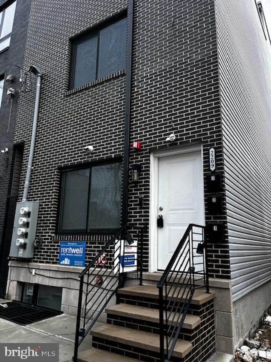 2209 N 7th!  A  Modern New Construction Triplex  &  High-Yield Investment Opportunity!!

Discover the perfect fusion of luxury residential living and savvy investment with this brand-new, modern construction triplex. Engineered for maximum rental income and minimum maintenance, this property is ideal for investors looking for a turn-key asset or owner-occupants seeking to live in one unit while offsetting their mortgage with the other two.

Three Independent Units beautifully appointed with Granite Counter Tops,  Stainless Appliances,  Microwave & Garbage Disposals, In-unit Laundry Centers, Central HVAC, and Recessed Lighting. Security System Access in each unit as well! 

 Unit 1 -  4 Bedroom, 4 Bath  Bi-Level, 1,710 Sq Ft , Projected Rent, $3,200..
Unit 2   - 2 bedroom, 2 bath , 866 Sq Ft, Projected Rent, $1,800. 
Unit 3   - 2 Bedroom, 2 Bath, 866 Sq Ft, $1,900 a month. Includes Roof Deck & Skyline Views!!

As of 3.18,26, all 3 units have pending applications!  RentWell is the  Rental Management Company, . taking care of all the rental needs / concerns.  

Rental License posted in documents.  

Featuring open-concept layouts, abundant natural light, and high-end finishes throughout.
Turn-Key Ready: Brand new, never-lived-in construction with builder warranties.
Separate meters for gas and electric to streamline landlord management.
Durable  high-quality vinyl plank flooring throughout.

Situated in a high-demand neighborhood, this property offers excellent commuter access throughout the city, close  to  cafes, restaurants,  & Temple University. 

With three units in a growing area, this property is designed to provide high cash flow. Perfect for long-term hold, or immediate high-end leasing.

Don't miss the opportunity to own a brand-new, cash-flowing asset in a prime location. Schedule your private tour today!