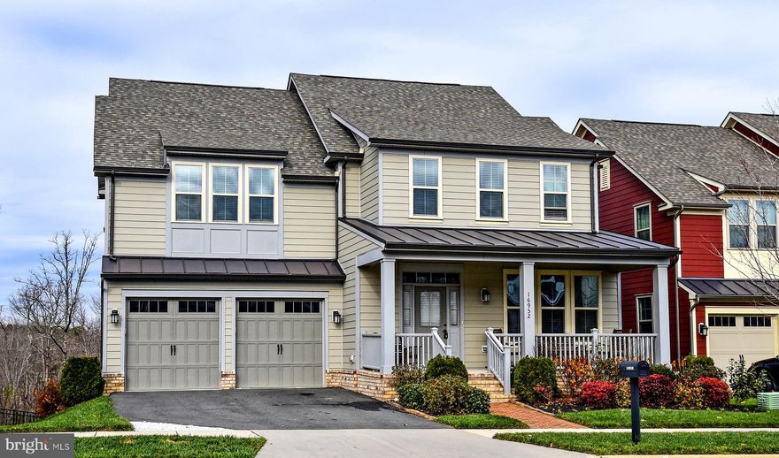 Multi-Generational Living at its best. The basement can be used as an in-law suite or a great entertainment area for the new owners. The home features close to 5000 square feet of living space, 5 Bedrooms, plus and additional bonus room in basement, 5.5 bathrooms. Hardwood Floors on the entire main level and entire upper level.  Covered Front Porch and Covered and Screened in Back Porches. There is a covered porch on every level of the home, the main level covered porch has stairs leading to the patio, all the back porches and patio offer a direct Golf Course view.  The main level Gourmet Kitchen,  offers upgraded Kitchen Cabinets, granite counter tops, backsplash, stainless steel appliance, large kitchen island and lots of space for a table. Now lets talk a little more about the basement. The sellers used it for multi-generational, independent living with a kitchen and laundry room, bedroom with lots of closet space and an attached bathroom. There is even a second room which can be used as office or guest room and right next to it is its own bathroom. Potomac Shores is an amenity filled community nestled around the Jack Nicklaus Golf Course featuring a state of the art fitness club, pools, tot lots, walking trails and more.