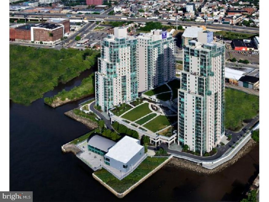 1 Parking Spot with this beautiful 1 bed 2 bath plus den condo. Fantastic North East views of both city and water with high ceilings and floor to ceiling windows. Amazing upgraded full sized kitchen with Granite counter tops and Stainless Steel appliances. Washer Dryer inside the unit. Hardwood floors. Huge balcony off the living room. All amenities included - Heat / Water / Sewer / Indoor Pool,Sauna,Steam room, 10,000 sq. ft. fitness center, Outdoor river deck, Hot tub, Shuttle to Center City, Gated secured entrance, 24 hour security. Very easy access to all major highways including 95, 76, 676. This is a luxury building. Why not live in style!!!