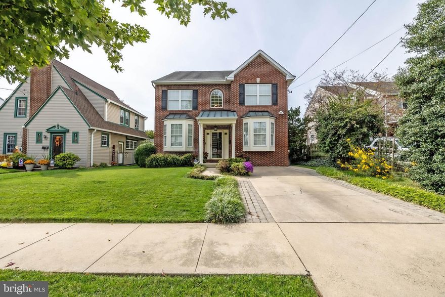 Want a new home for the holidays? Here’s your chance to own a beautiful colonial on one of the prettiest blocks in Fox Chase! This 4-bedroom, 3.5-bath, bright and airy home was custom built in 2001 and truly checks all the boxes for today’s wants and needs. It’s in move-in condition and ready for its next family. From the moment you arrive, you’ll be welcomed by a paver-lined path, covered copper entry/porch, architectural roof shingles, Gutter Helmet gutter guards and brick front. Step inside to a two-story foyer with a Palladian window, custom stair rail, and ceramic tile flooring. The main level offers 9’ ceilings, a bright eat-in kitchen with updated cabinets, flooring, and dishwasher (all 2019), stainless steel sink with garbage disposal, & Anderson sliders to a custom built paved patio and landscaped rear garden. You’ll also find a powder room, spacious living and dining rooms with hardwood floors and bay windows, and French doors leading into the family room with lighted ceiling fan. A true highlight and rare find is the private in-law suite, complete with its own covered entrance, sitting room, kitchenette, bedroom with lighted ceiling fan, full bath, and generous closet space. Upstairs, the over sized primary suite boasts two walk-in closets lighted ceiling fan, a full en suite with double vanity, stall shower and a soaking tub/shower combo, plus two additional bedrooms and another full double vanity bath with soaking tub/shower combo!
The professionally landscaped rear yard is a private retreat with a shed, irrigation system, and perennial plantings that bloom beautifully throughout the seasons. The perimeter of the property has motion detection flood lamps for added security.
Full unfinished poured concrete basement is huge and awaits you special touch . Laundry area with washer, gas dryer, utility sink, a 50 gal. hot water heater (2021), central air and gas whole house heater, french drain system , new sump pump,  Alarm system, 6 panel doors and upgraded 1-piece toilets throughout. You really have to see this home to experience how lovely it is. So convenient to parks and walking trails, public transportation (20 minute ride to Center City on the Fox Chase Line), major roadways, schools, shopping, dining and health care. 12 month home warranty included. Treat yourself and your family for the holidays.