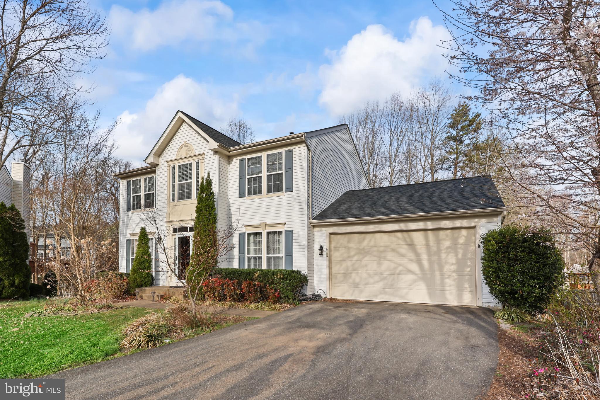 Home is tenant occupied with limited showing availability due to tenant working nights. Please be patient for showing availability. Property will be available to show on Monday, 5/26 after 4pm. Welcome to 27 Wild Plum Ct—a charming 4-bedroom, 2.5-bath home perfectly situated at the end of a quiet cul-de-sac. The heart of the home is the updated kitchen, featuring white cabinetry, granite countertops, and stainless steel appliances. It opens seamlessly to a cozy family room with a gas fireplace, creating the ideal space for everyday living and entertaining.
Just off the kitchen, enjoy the light-filled sunroom—perfect for morning coffee or relaxing evenings. The main level also offers a formal dining room with elegant chair rail detailing and a spacious living room highlighted by a large bay window.
Upstairs, the primary suite boasts a walk-in closet and an ensuite bath with a soaking tub, separate shower, and dual vanities. Three additional bedrooms share a well-appointed hall bath with a tub/shower combo.
Step outside to a large deck overlooking a private, fully fenced backyard that backs to trees—complete with a lower-level patio for extra entertaining space. A two-car garage adds convenience, and the location can’t be beat: close to I-95, commuter lots, Quantico, shopping, dining, and more.