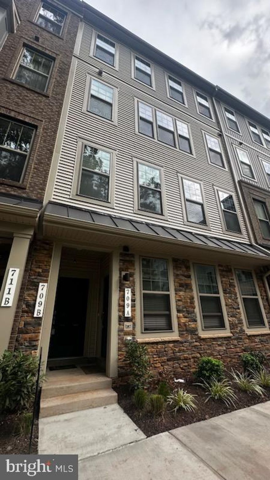 Beautiful 2024 new build -The Julianne model is more than just a townhome-style condo — it’s your new home base for stylish, modern living. This upper-level 3-bedroom condo combines thoughtful design with everyday convenience, featuring an attached garage and a charming covered balcony.
Step inside and experience the open-concept layout that flows effortlessly from the expansive kitchen to the dining and family rooms — perfect for hosting everything from cozy dinners to lively get-togethers. Want to elevate your culinary game? Choose the gourmet kitchen upgrade and entertain with ease.
Upstairs, unwind in your spacious primary suite — your own personal retreat — while two additional bedrooms offer flexibility for family, guests, or a home office. A full laundry room on the bedroom level makes everyday chores a breeze. Dream location for commuters as you can walk to the VRE and easy access to rt 28 and I66. Walk to restaurants