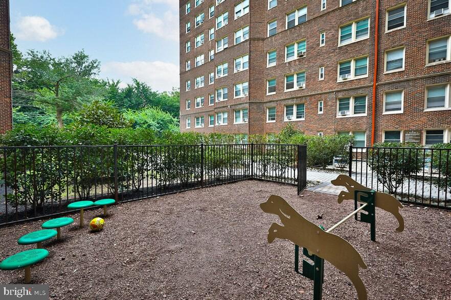 Fairfax Apartments, located at 4247 Locust Street in Philadelphia, PA 19104, offers a unique blend of modern convenience and classic charm, making it an ideal place to call home. This 10-story high-rise features a variety of floor plans, ranging from cozy studios to spacious two-bedroom units, with rents starting at $1,225 and going up to $2,795 per month. Each unit is thoughtfully designed with features such as hardwood floors, stainless steel appliances, walk-in closets, and large bedrooms. Some units also boast modern open floor plans, while others retain a vintage appeal with character-rich details.
Residents will love the array of amenities designed to enhance their living experience. The building includes a 24-hour on-site laundry room, a newly renovated bike room, and optional parking. For pet lovers, Fairfax Apartments is a pet-friendly community complete with a dog park and pet spa. The property also offers a fitness center, business center, and a gated entry for added security. Unique features like a Wi-Fi lounge, fire pit, and professional landscaping add to the appeal, ensuring that residents have everything they need right at their fingertips.
The neighborhood of Spruce Hill, where Fairfax Apartments is situated, is renowned for its urban appeal and diversity. This vibrant area is just minutes away from the University of Pennsylvania and Drexel University, making it an excellent choice for students and professionals alike. The community is well-served by public transportation, with a high walk score of 96 and a transit score of 87, ensuring easy access to all that Philadelphia has to offer.
Spruce Hill is characterized by its tree-lined streets, quaint shops, and a variety of dining options, including ethnic eateries and cozy coffee shops. Residents can enjoy free movies, orchestra concerts, and Shakespeare shows in the nearby Historical Clark Park. The area is also patrolled by Philadelphia police, University City security, and UPenn police, providing a safe and secure environment.
Fairfax Apartments is not just a place to live, but a community where residents can thrive. With its combination of modern amenities, classic charm, and a prime location in one of Philadelphia's most desirable neighborhoods, Fairfax Apartments offers an unparalleled living experience. Whether you're looking for a quiet retreat after a busy day or a vibrant community to engage with, Fairfax Apartments has something for everyone. Schedule your tour today and discover why future residents will love calling Fairfax Apartments home.
** Pricing and availability subject to change on a daily basis ** Photos are of model units ** Parking may be available for additional fee **