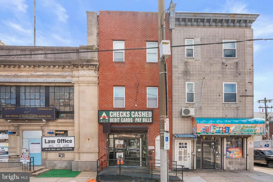 Prime income-producing, mixed-use opportunity in the heart of Fairmount’s bustling business district. This legally CMX-2.5 zoned property features a first-floor commercial storefront occupied by a long-term, well-established check-cashing business—a true neighborhood staple—plus two fully rehabbed 2-bed/1-bath residential apartments on the second and third floors. The commercial space offers strong street visibility and steady foot traffic, while the updated apartments deliver modern finishes and comfortable layouts ideal for reliable rental demand. Whether you’re an owner-occupant looking to live upstairs while your business or tenant offsets costs, or a savvy investor seeking a stabilized addition to your portfolio, this asset checks every box. Located moments from Fairmount Park, the Franklin Institute, and Schuylkill River Park, and a short drive to the Philadelphia Museum of Art, the Penn Museum, and Eastern State Penitentiary, the address combines daily convenience with world-class cultural attractions. Showings by appointment only. Schedule your private tour today.