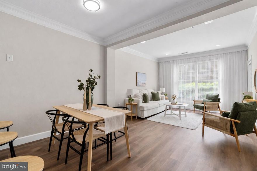 Welcome to the easy life!  You'll love living at The Fitz, with its resort-style amenities and convenient location. This light & bright home has a totally new kitchen, new floors and fresh paint throughout and is perfectly situated for privacy and convenience. Enjoy a quiet cup of morning coffee or cocktails after work on your private terrace, which features mature evergreens for privacy.  The open-concept living area gives you space to entertain, work, or relax.  You have everything you need, including your in-unit washer & dryer.  While you will enjoy the views of the lovely interior courtyard, you will love the convenience of being on the Plaza Level, with easy access to all of the amenities and ZERO STEPS to your garage parking spot.  The Fitz has all the amenities you could want and more: Outdoor pool, fitness center, club room, billiard room, media room - even a dog play area! The condo fee covers all of that and even include cable & internet. You are so close to everything - a Giant grocery store is next door, the Rockville Metro is 3 blocks away, Rockville Town Center is 2 blocks. The building is secure with on-site management and gated entry - even to the parking garage.  This one has it all: A blend of luxury, convenience, and comfort in an unbeatable location