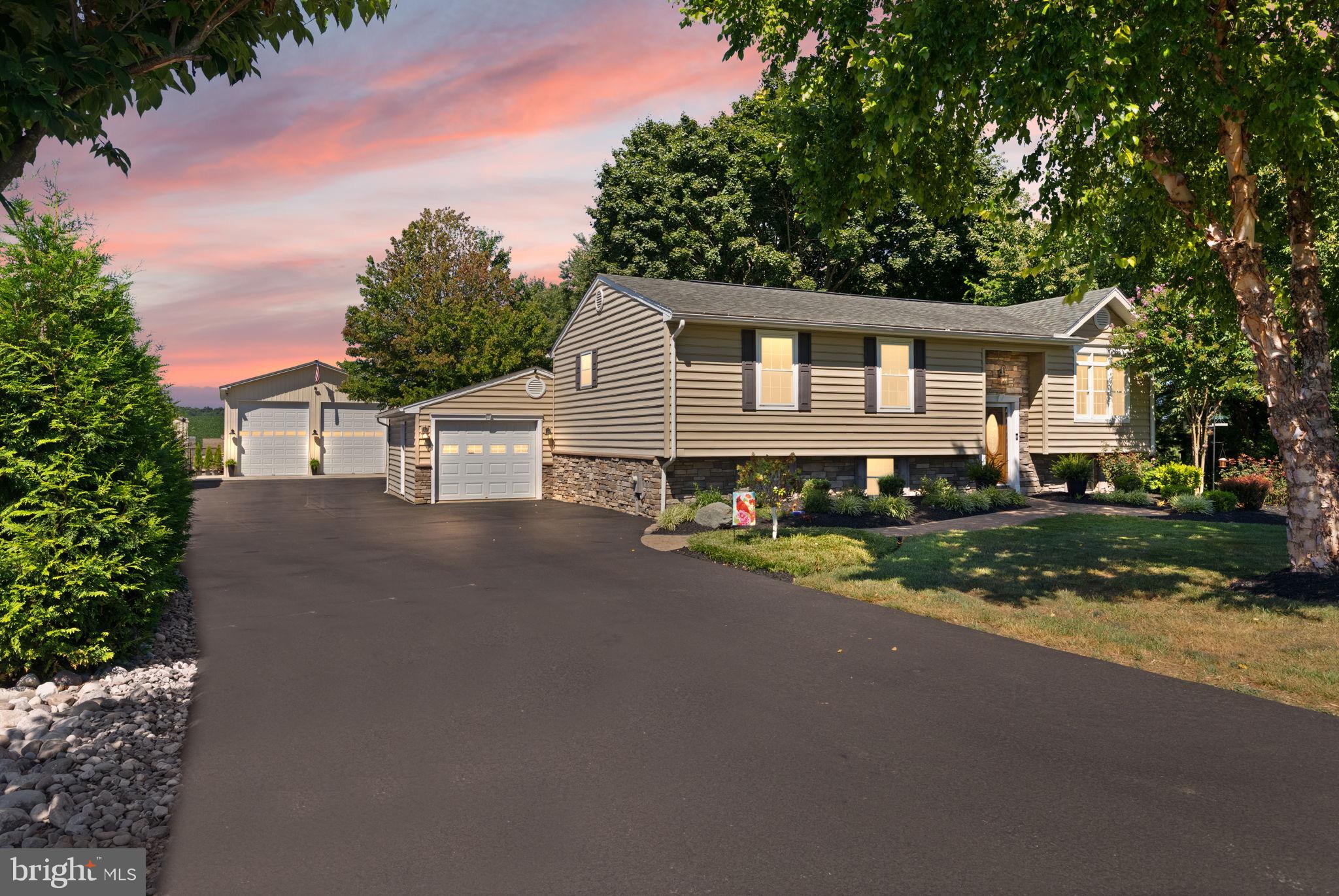 Welcome Home to this wonderfully updated and amenity rich 4 bedroom 3 bathroom home here in Westminster. Just minutes from town, this property is jam packed with awesome features and is an entertainers dream. Exterior highlight features include a MASSIVE detached 30'W x 50'L x 16'H building with oversized insulated doors/rear drive thru door/propane heater/9000lb lift, a fabulous fully fenced level backyard with pool and large entertaining patio/deck spaces, an extremely wide and deep driveway, attached garage, beautiful mature landscaping, and large gazebo for entertaining. Interior highlights include a tastefully renovated kitchen with carrera marble countertops and stainless steel appliances, a lovely sunroom with vaulted ceiling leading to the deck/patio, hardwood flooring, 3 bedrooms and 2 full baths on the upper level, 1 bedroom and additional full bath on the lower level, bonus club room and sitting room on lower level with recessed lighting and lvp flooring. Recent notable updates include HVAC 2024, newly paved driveway 2025, detached garage 2022, roof and windows 2018. This home has alot to offer, in a very convenient location... book your showing today!
