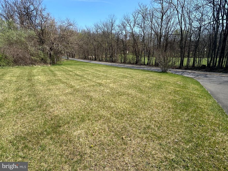 This 2.35-acre BUILDABLE parcel ("Lot 3") on Morgan Grove Road is located beside house #583. Lawn, trees and paved DRIVEWAY access are already in place. Not part of an HOA, the lot is UNRESTRICTED. A detailed SURVEY shows the boundary lines and septic reserve area. A septic PERC test is on file. Easements are in place for the electric company, and house #583 has a right-of-way along the driveway. The LOCATION is superb! This rural setting is conveniently close to historic Shepherdstown for dining, events and shopping; minutes from Duffields MARC commuter train station and Morgan Grove Park; and about an hour from Dulles Airport.