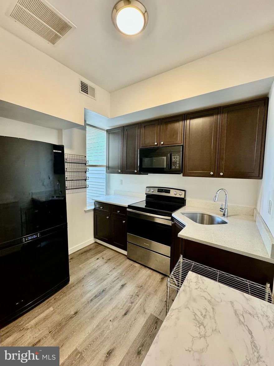 Welcome to 2026 N 8th St #2, a modern and updated 3-bedroom, 3-bathroom apartment nestled in North Philadelphia near the Temple University 9th St train stop. This recently constructed gem features a well-equipped kitchen with a refrigerator, stove, microwave, and the convenience of in-unit washer and dryer. Stay comfortable year-round with central air and heating, and enjoy the bright and airy atmosphere created by recessed lighting and plenty of windows. Your new home is designed for both convenience and style, providing a welcoming and comfortable living space.