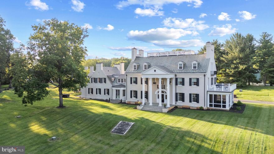 “Venture,” circa 1900,  is a very rare offering. Over 8 gated acres in Baltimore County located in  prestigious Greenspring Valley.  Originally built by Edward Burke, one of Teddy Roosevelt's rough riders, with expansive Baltimore history. A complete 5-year gut renovation to “new home” masterpiece with historic bones. New 6,000 sq ft garage with potential in-law suite on second floor, whole house automation including audio and lighting, custom Lowen windows and doors, all new HVAC, plumbing, electric, custom moldings, hardwood floors throughout, elevator, all top-of-the-line materials and craftsmanship. New kitchen with Calcutta gold marble countertops, paneled appliances, custom hood, professional range, coffee bar with fridge drawers, ice maker, and butler pantry. Large ballroom size living room with six bedrooms, all en-suite, heated marble floors in baths with large walk-in closets.
3 washers and dryers, lower-level gym, and theater.   Decor is neutral and ready to make your own.