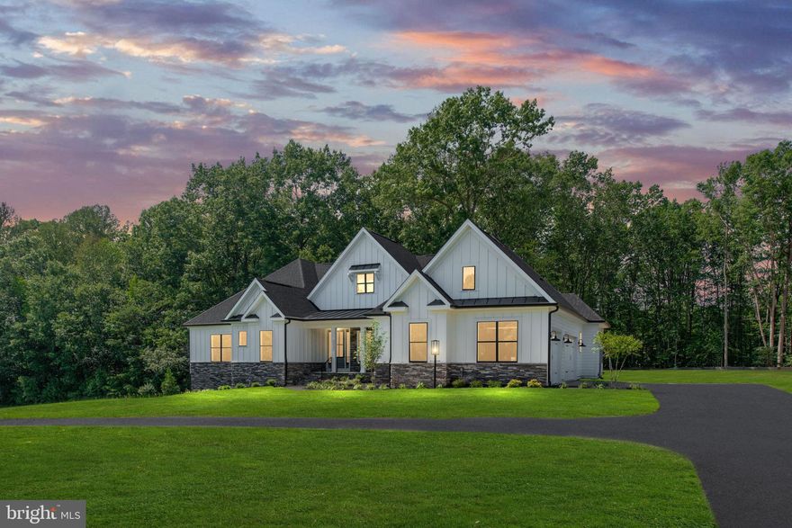 Discover the perfect blend of luxury, craftsmanship, and comfort in this 4-bedroom, 5.5-bathroom custom-built Noel model by Bryton Homes. The main level offers 3,290 square feet of finely appointed living space, coupled with an additional 1,395 finished square foot rec room /flex space, and bathroom on the lower level, with an additional 1,776 square feet unfinished spaces to make your own.

Thoughtfully designed with both elegance and function in mind, this home showcases superior architectural detail, high-end finishes, and exceptional livability throughout. Step inside to soaring ceilings, expansive windows, and an open-concept layout that floods the home with natural light. The gourmet kitchen is a chef’s dream, featuring premium appliances, an oversized island, and custom cabinetry—all flowing seamlessly into the spacious great room with a statement fireplace.

Retreat to the luxurious primary suite with a spa-inspired ensuite and generous walk-in closet. Additional bedrooms are spacious and bright, perfect for family, guests, or a home office setup. The fully finished lower level offers flexible living space—ideal for a home theater, gym, or entertainment area.

Set on a beautifully landscaped lot, this home offers indoor-outdoor living at its best, with a covered patio, optional outdoor kitchen, and plenty of room to relax or entertain.
Experience the hallmark of Bryton Homes’ custom quality—an ideal combination of timeless design, expert craftsmanship, and modern convenience.

Rosni Estates isn't just a collection of luxurious homes; it's a community built around the concept of personalized living. With estate-sized homesites spanning 5 to 12 acres, residents have the space and freedom to create a truly unique oasis. Imagine designing expansive gardens, crafting the ultimate outdoor entertaining area, or dedicating space for your favorite recreational pursuits. At Rosni Estates, the possibilities are as vast as the properties themselves. Whether you dream of a tranquil retreat surrounded by nature, a vibrant space for gatherings, or a combination of both, these generous lots provide the canvas for your vision.