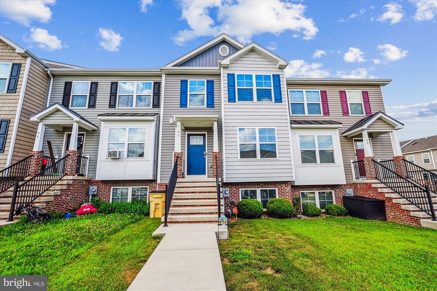 Welcome home to this beautifully maintained townhome in sought-after Northern Berkeley County—perfectly situated for commuters with quick access to I-81, Hagerstown, the MARC train, and downtown Martinsburg for all your shopping and dining needs.

The main level features a spacious living room with stylish and durable luxury vinyl plank flooring. Step outside to enjoy the expansive 12x16 deck with stairs leading to your stamped concrete patio and a fully fenced backyard enclosed by a white vinyl privacy fence—ideal for outdoor entertaining or peaceful evenings at home.

Upstairs, you'll find generously sized bedrooms, including a spacious owner's suite, and plenty of storage throughout. The double box bay window spans two floors, adding charm, natural light, and enhanced curb appeal.

The fully finished basement offers a second living room, perfect for a rec space, home theater, or additional lounging area.

Conveniently located near major hospitals, grocery stores, and recreational areas, this home blends comfort, space, and accessibility.

Don’t miss your opportunity to make this one yours!