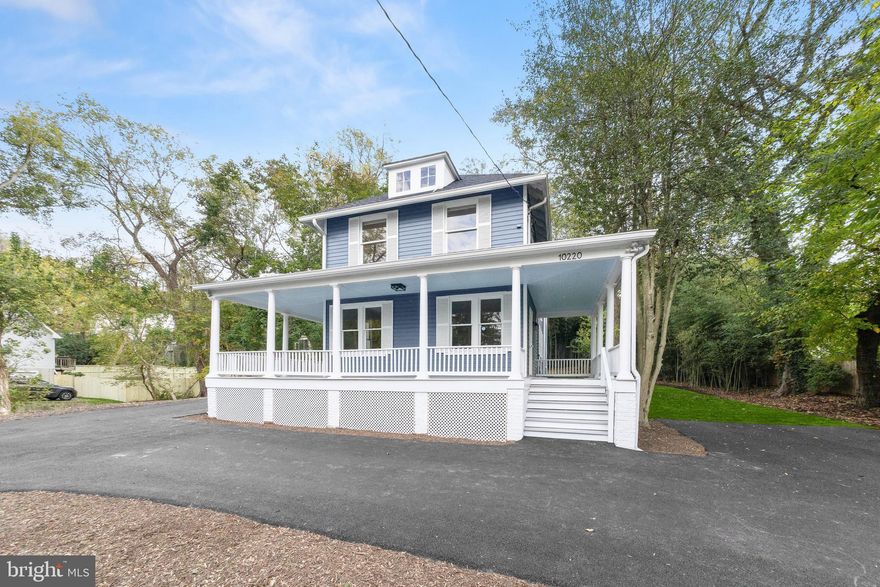 NEW Price! Motivated Seller. Please note: The new addition brings the total sq. ft of the home to 2,918. Love the charm of older homes but don’t want to give up modern conveniences? You can have it all at 10220 Capitol View Avenue. This home originally built in 1900, is sited on two lots totaling almost one acre of land. Located in historic Capitol View Park the home has been renovated and enlarged from top to bottom. The developer has kept the charm and original woodwork in the original structure but has added a large modern kitchen and family room at the rear of the building, with a generous primary suite and laundry room above. A large wraparound porch welcomes guests with entry doors on either side of the home. Enjoy the formal living room with the original wood floors which provides a great space for entertaining or lounging, and provides entry into the formal dining room with an access door to the porch and side yard. Beyond the dining room the home opens up to the stunning modern open-concept kitchen with a large breakfast bar, lots of counter and cabinet space and a family room with French doors to the rear porch and backyard. A side hallway off the dining room provides access to a new full bath and stairs to the basement. Upon entering the upper-level a hallway provides access to the convenient laundry room and half bath, and also leads to the spacious primary suite with views overlooking the serene back yard. The stunning primary bath with shower and double sink vanity, closets and warm neutral carpeting make this space a cozy escape. There are two additional bedrooms and a new full bath on this level. The lower level features a wonderful room that can be an additional bedroom, workout room, office, or recreation room with an egress window close by for safety. The utility room with new HVAC systems which includes a tankless water heater completes the lower level. A new circular driveway provides ample room for parking with parking pads on both sides of the home. This home enjoys the convenience of being close to public transportation (Ride-On bus, Metro and Marc Train), as well as the Connecticut and Georgia Avenue corridors. Enjoy restaurants, shops, Farmer’s Markets, and libraries in Silver Spring and Kensington. The location is also close to Rock Creek Park, and local parks for outdoor hiking, biking, and fun. Welcome home!