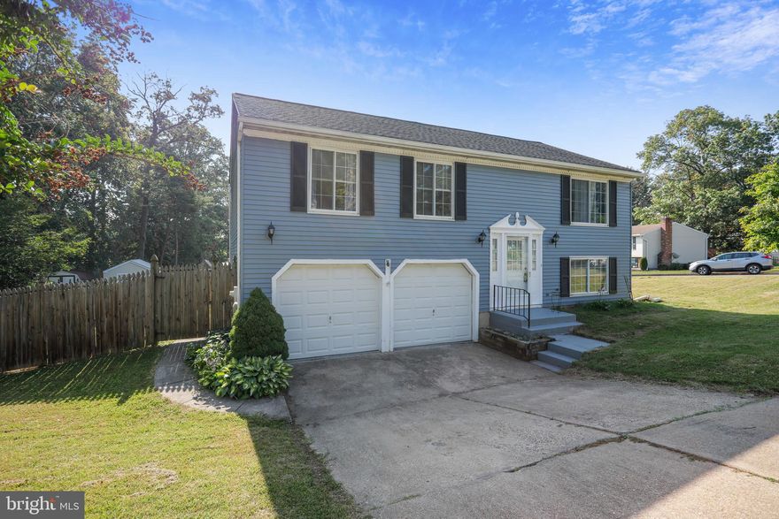 REDUCED TO SELL! Welcome Home to this beautifully renovated, 3-bedroom, 2-full bath, spacious split-foyer home perfectly positioned on a huge corner lot with a fenced rear yard, large deck-perfect for entertaining and the convenience of a 2-car attached garage... all perfectly positioned in sought after Perry Hall!  On the main level, relish in the stunning new, upscale wood-laminate flooring in an open floor plan with 3 spacious bedrooms, large living room, bright dining room and a brand-news sophisticated kitchen.  The kitchen has been entirely updated to include granite countertops, gorgeous cabinets, stainless appliances, recessed lighting and a breakfast bar! The large living and dining rooms are sun-filled with large front window, new recessed lighting and sliders to the deck & backyard.  The lower level offers a huge family room, gorgeous new full bath, a bonus space for your office or play area and a dedicated laundry area.  Don't miss the convenient & direct access from lower level to the oversized 2 car garage, allowing plenty of room for storage.   You won't run out of space with the added storage under the steps and in the attic too! Pride of ownership shines through with the brand-new flooring, new doors, fresh paint and much more! Outside is an entertaining dream with the large deck overlooking the spacious rear yard and steps leading to the lower level patio, perfect for the family cookout & fire pit!  Conveniently located to shopping and commuter routes yet ideally positioned in this sought after, HOA FREE neighborhood.