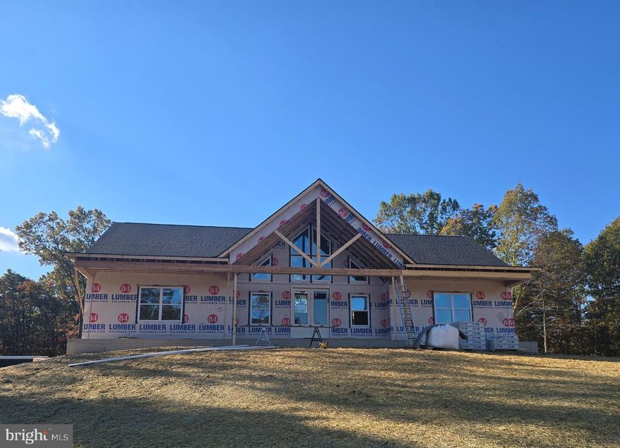 March 9th 2026 delivery on this great offering located on a sprawling  20-acre lot, this charming ranch-style home is waiting for your furnishings to call it home.  With construction set to be completed in 2026, this property offers a unique opportunity for dream a residence in a serene, wooded setting. 

The home features a thoughtful design that seamlessly blends comfort and functionality, making it an ideal retreat for those seeking tranquility. Step inside to discover a spacious layout that includes four well-appointed bedrooms and three and a half bathrooms. 

The heart of the home includes a cozy gas fireplace, perfect for those chilly evenings. The kitchen is equipped with modern stainless steel appliances, including a built-in microwave, dishwasher, and electric oven/range, ensuring that meal preparation is both efficient and enjoyable. 

The main floor laundry adds convenience to your daily routine, while the expansive basement offers endless possibilities for additional living space, complete with a connecting stairway and outside entrance. 

Imagine transforming this area into a game room, home gym, or even a cozy guest suite. Outside, the property is a nature lover's paradise, backing up to lush trees and offering a peaceful view of the woods. The sloping terrain adds character to the landscape, making it perfect for outdoor activities such as hunting or simply enjoying the beauty of nature. 

A spacious 14 x 16 composite deck invites you to unwind and soak in the serene surroundings. Parking is a breeze with an attached garage that accommodates two vehicles, along with additional driveway space for guests. The excellent condition of the property ensures that you can move in with peace of mind, knowing that quality materials have been used throughout, including batts and blown-in insulation for energy efficiency. 

Located in a tranquil area, this home offers the perfect balance of privacy and accessibility. Enjoy the benefits of rural living while still being within reach of local amenities, shopping, and recreational opportunities. This property is not just a house; it's a place where memories will be made, and a true sense of home will flourish. 

Embrace the opportunity to create your own sanctuary in this beautiful setting with over 22,000 acres of Sleepy Creek lake & forest just down the road. This home is situated at the end of the road for added privacy. New plat will show 20 acres.