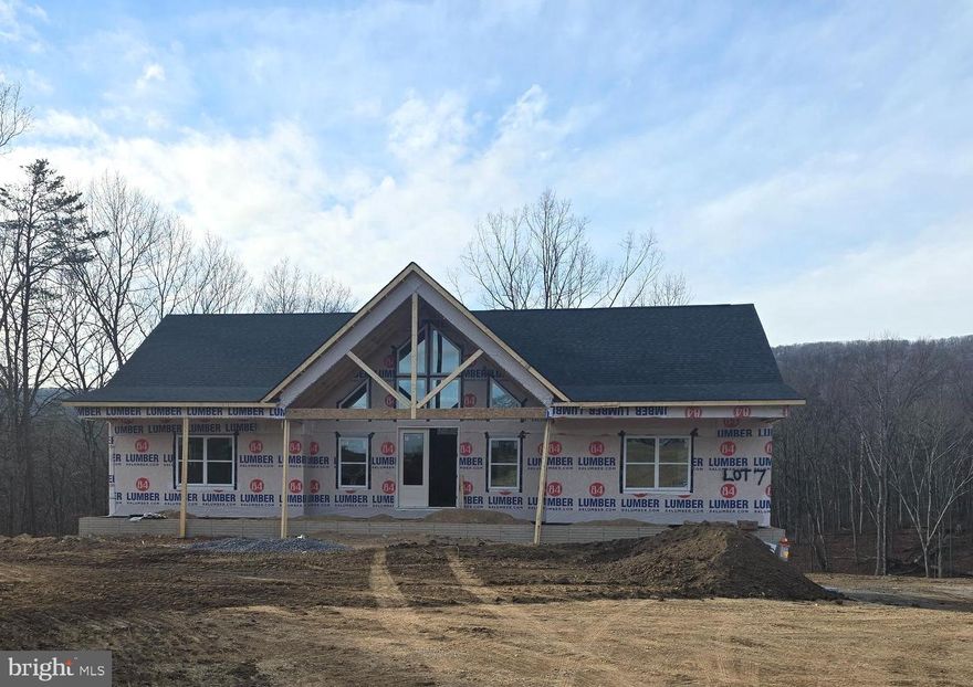 March 9th 2026 delivery on this great offering located on a sprawling  20-acre lot, this charming ranch-style home is waiting for your furnishings to call it home.  With construction set to be completed in 2026, this property offers a unique opportunity for dream a residence in a serene, wooded setting. 

The home features a thoughtful design that seamlessly blends comfort and functionality, making it an ideal retreat for those seeking tranquility. Step inside to discover a spacious layout that includes four well-appointed bedrooms and three and a half bathrooms. 

The heart of the home includes a cozy gas fireplace, perfect for those chilly evenings. The kitchen is equipped with modern stainless steel appliances, including a built-in microwave, dishwasher, and electric oven/range, ensuring that meal preparation is both efficient and enjoyable. 

The main floor laundry adds convenience to your daily routine, while the expansive basement offers endless possibilities for additional living space, complete with a connecting stairway and outside entrance. 

Imagine transforming this area into a game room, home gym, or even a cozy guest suite. Outside, the property is a nature lover's paradise, backing up to lush trees and offering a peaceful view of the woods. The sloping terrain adds character to the landscape, making it perfect for outdoor activities such as hunting or simply enjoying the beauty of nature. 

A spacious 14 x 16 composite deck invites you to unwind and soak in the serene surroundings. Parking is a breeze with an attached garage that accommodates two vehicles, along with additional driveway space for guests. The excellent condition of the property ensures that you can move in with peace of mind, knowing that quality materials have been used throughout, including batts and blown-in insulation for energy efficiency. 

Located in a tranquil area, this home offers the perfect balance of privacy and accessibility. Enjoy the benefits of rural living while still being within reach of local amenities, shopping, and recreational opportunities. This property is not just a house; it's a place where memories will be made, and a true sense of home will flourish. 

Embrace the opportunity to create your own sanctuary in this beautiful setting with over 22,000 acres of Sleepy Creek lake & forest just down the road. This home is situated at the end of the road for added privacy. New plat will show 20 acres.