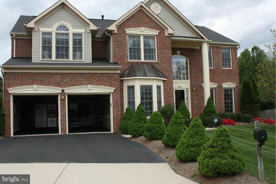 Absolutly stunning brickfront Col.w/3 Fin Lvls & 2 car Gar on Premium Lot in CUL-DE-SAC Hrdwd FLRS Gourmet kitw/CTR ISL CKTP w/Granite HUGE 6' Exded FM RM w/Stone FRPL Bay window in DR SPACIOUS MBR w/extion & W.I. Closet LUX BAw/soak tub & Sep.SHWR FIN LL w/complete media RM w/SPACE TV & Surnd sound, Wet Grnte Bar, Ful BA & Extded Rec RMw/Gas FRPL.