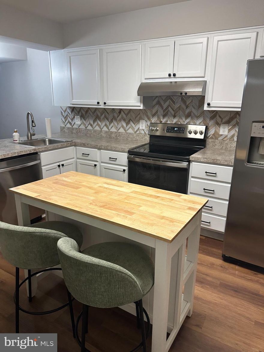 Welcome to your affordable, bright and  cozy two-bedroom, two-and-a-half-bath townhome at 2069 Tanglewood Drive in Waldorf! This charming two-level gem in the convenient Tanglewood community feels fresh and move-in ready, perfect for first-time buyers, downsizers, or anyone looking for low-maintenance living close to everything Southern Maryland has to offer.
As you step inside, you'll love the updated luxury vinyl plank (LVP) flooring that flows beautifully throughout the main level; it's durable, stylish, and super easy to keep clean. The newer appliances in the kitchen make everyday cooking and entertaining a breeze, giving the space that modern, turnkey vibe everyone wants.
Upstairs, the two spacious bedrooms offer plenty of room to relax. 
Out back, enjoy your own private fenced yard, ideal for pets, summer barbecues, or just kicking back with a good book in your slice of outdoor space.
With its thoughtful updates, practical layout, and great location, this townhome is the kind of place you'll be proud to call home. Don't miss out; this home, it's ready for you!