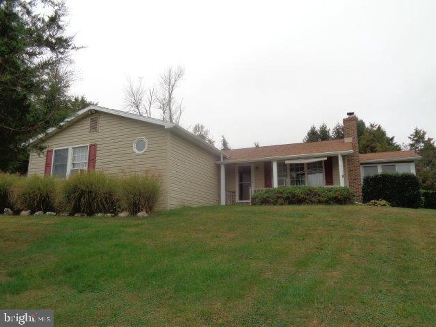 5+ acres surround this brick/vinyl ranch home with quiet setting. 10 external spotlights, roof & vinyl siding approx. 4-5 years old, 20 x 24 Master Bedroom suite with laundry facilities, gas fireplace in living room, Florida room, Harmon wood-coal stove in basement, generator, wood deck with brick patio, new Anderson storm doors, underground cable and electric lines, 64' x 40' detached metal storage building and much more. See associated docs for additional info.