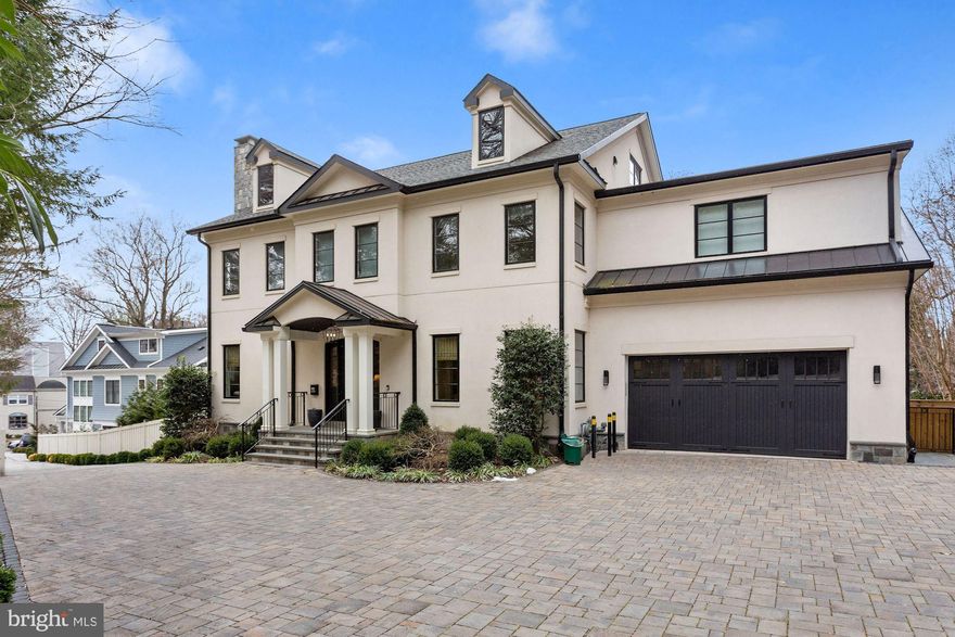 This one has it all!! Set privately off the street, this Kent residence was built in 2018 by AR Custom Builders. Boasting an inviting yet private 1/2 acre setting there are 8,250 square feet of modern living across four levels. Showstopping features include an elevator, rooftop terrace, finished lower level with gym, two 2-car garages and a pool. An elegant living and dining room flank the foyer and a spacious eat-in kitchen with island opens to a light-filled family room with gas fireplace. A butlers’ pantry with beverage fridge adds ample storage. French doors span the rear of the home, making for great views and easy access to the outdoors. A mudroom, office and powder room complete this level. The second level includes a large primary suite with private sitting room, en-suite bath with rain shower, soaking tub and a stunning walk-in closet. This level contains three additional bedrooms, all with en-suite bathrooms, and a dedicated laundry room. The upper level offers gorgeous neighborhood views accessible from the rooftop terrace. There is a large family room with wet bar and another bedroom and bathroom. The fully finished lower level offers a recreation space, gym, bedroom and bathroom and access to the backyard. The outdoor spaces offer a perfect space for entertaining and family living, with multiple terraces, lower level flagstone lounge area, and large pool.