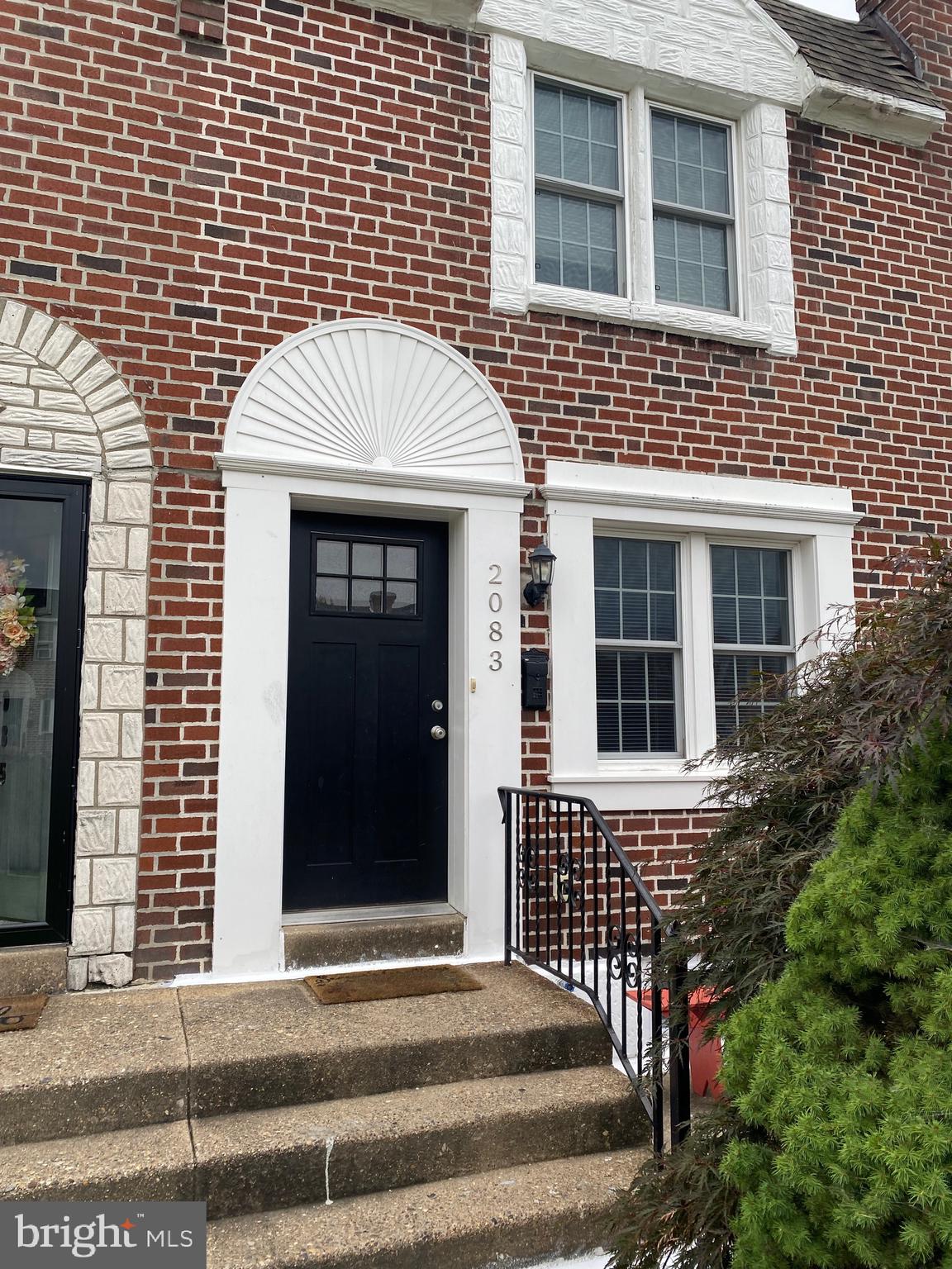 Beautifully Updated Row Home with Modern Touches ,Classic Charm and contemporary upgrades. The first floor welcomes you with hardwood floors, elegant chair rail molding, fresh neutral tones, and a stylish wrought iron staircase that adds a touch of sophistication.The kitchen is a standout feature — centered around a large granite island, it offers ample prep space, modern pendant lighting, and sleek finishes that elevate both form and function. Recessed lighting and abundant natural light throughout the main level create a warm, inviting atmosphere perfect for everyday living and entertaining.Upstairs, you’ll find three spacious bedrooms with carpeting and a full bath featuring a skylight and beautifully tiled tub/shower combo. The finished basement provides even more living space, and a convenient powder room — ideal for a media room, play area, or home office. For comfort the home has a newer high efficiency central HVAC system.