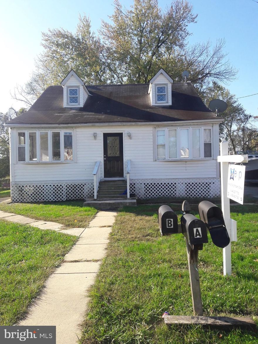 Great investment opportunity in a convenient location!  3BR/1BA unit on main floor, 2BR/1BA unit on the upper floor and a separate detached 2BR/1BA.  Don t miss out!