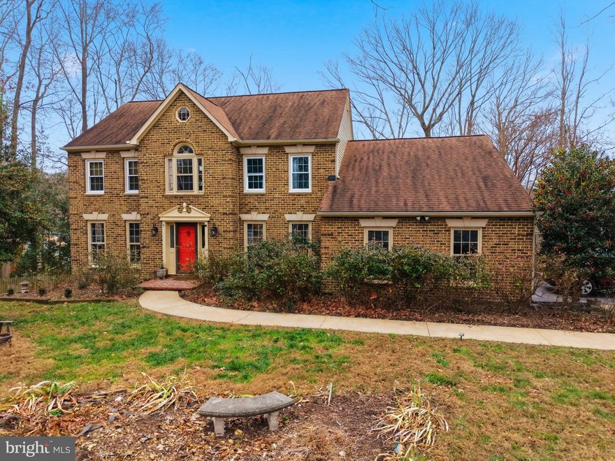 Living in Aquia Harbour means gated security and access to a marina, golf, and miles of trails, outdoor pool, lots of fun and adventure. This one is a "unicorn" in Stafford—5 bedrooms + a private in-ground pool! Massive Lot: Nearly a half-acre at the end of a quiet, private cul-de-sac.

This exceptional brick Colonial with a resort-style pool offers timeless elegance and modern comfort. Ideally positioned on a beautifully landscaped corner lot within a quiet cul-de-sac, the home creates a private, inviting setting designed for both relaxation and entertaining. Inside, rich hardwood flooring, custom wainscoting, and detailed wood trim set a sophisticated tone throughout. The chef’s kitchen features granite countertops, stainless steel appliances, a charming bay window, and generous workspace, seamlessly flowing into the warm and inviting family room anchored by a striking brick fireplace with gas logs. An oversized pantry with a second refrigerator and washer/dryer adds exceptional convenience, while the formal living and dining rooms provide gracious spaces for hosting.

The upper level showcases an expansive primary suite with a luxuriously renovated en suite bath, accompanied by three additional generously sized bedrooms and a beautifully updated hall bathroom. The lower level offers a versatile fifth bedroom or guest retreat with a private walkout side entrance.

Enjoy effortless access to I-95 and E-ZPass lanes, just minutes from Quantico, premier shopping, dining, parks, recreation, and a wealth of nearby attractions. This private gem offers an exceptional blend of convenience and exclusivity—an opportunity not to be missed.