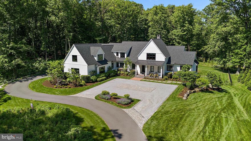 420 Campbell in Greenville, DE, is a stunning modern farmhouse designed for those who
appreciate luxury, space, and innovation. With 7,284 square feet of living space, this home
offers five bedrooms, five full bathrooms, and two half-baths, all situated on a sprawling 3.03-
acre lot. Designed and built by Dewson Construction, known for its impeccable craftsmanship, this
residence blends old-world charm with modern amenities. From the expansive gourmet kitchen
to the fully finished lower level with a movie theater, this home is designed for relaxation and
entertainment.
Step into a spacious living room with soaring ceilings, rustic hardwood floors, and a grand
fireplace, making it perfect for cozy gatherings. The gourmet kitchen is a chef's dream, featuring
a Wolf gas range, Sub-Zero fridge, and custom cabinetry. 
The primary suite offers a luxurious
retreat with a private terrace, spa-like bathroom, and custom walk-in closet. The outdoor space
is just as impressive, with multiple decks, a fire pit, and a high-fidelity multi-zone audio system
to enhance your outdoor living experience.
This smart home features cutting-edge technology, including energy-efficient systems, multi-
zone audio, and a Control 4 home automation system. The home's private fitness center,
oversized sauna, and dedicated entertainment spaces offer an unmatched level of comfort and
convenience.
For those in search of a private oasis in one of Delaware's most sought-after communities,
420 Campbell is the home you've been waiting for. Don't miss your chance to experience this
unique property—schedule your private tour today!