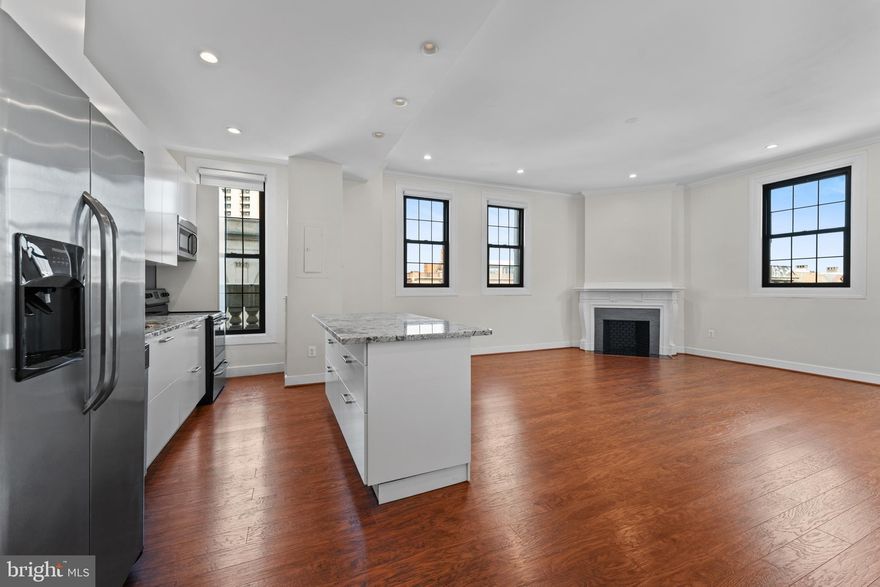 Welcome home to the iconic The Belvedere, where historic charm meets modern luxury. This beautifully maintained and fully renovated 2-bedroom, 2 full bath residence offers sophisticated city living at its finest. Renovated from wall to wall, this stunning condo features an expansive open-concept layout, a beautifully designed kitchen with a spacious island, granite countertops, stainless steel appliances, and the added convenience of an in-unit washer and dryer—perfect for effortless everyday living. Enjoy two tastefully renovated bathrooms, generously sized bedrooms with soaring ceilings, a charming decorative fireplace, and an abundance of natural light that fills the home throughout. Residents of The Belvedere enjoy 24-hour lobby service for added security and convenience, along with access to the building’s remarkable historic amenities, including grand ballrooms, the elegant John Eager Howard Room, the legendary Owl Bar, a 13th-floor lounge with breathtaking city views, and a unique lower-level shopping arcade. Ideally located near some of Baltimore’s finest dining, shopping, entertainment, and everyday conveniences, this is urban living at its absolute best. Schedule your private tour today!