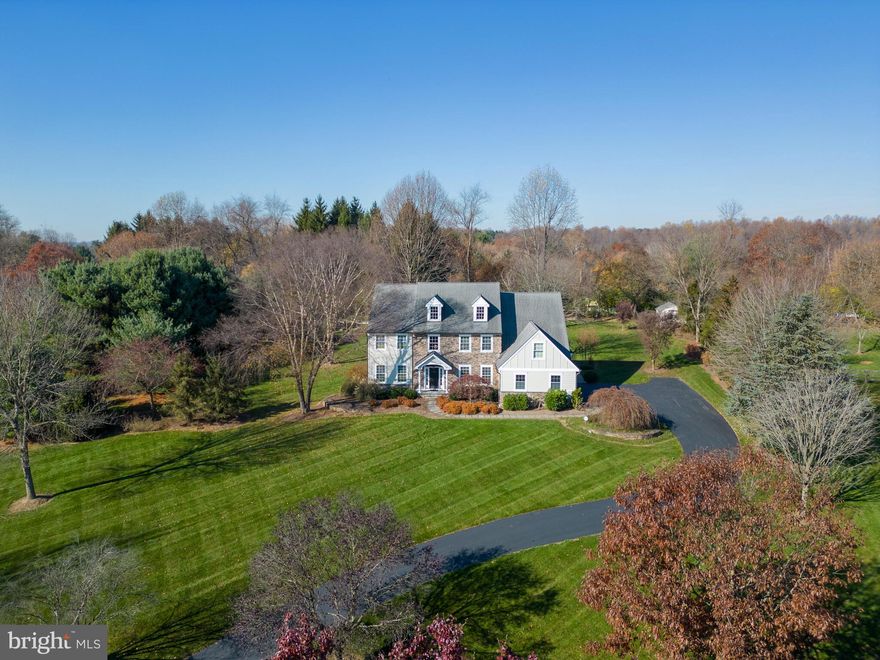 This beautiful Colonial situated in highly desirable Chalfont St Giles is a MUST SEE.  This home sits on 1.6 acres of professionally landscaped property and is within walking distance of Marsh Creek Lake and trails.  The outside features beautifully designed landscape lighting around the property, your own private raised garden area, a patio for entertaining, and wonderful views.  From the front door you walk into an open foyer with an abundance of natural light.  This home boasts a formal living room with brand new carpet and a formal dining room that has a decorative chair rail to add character.  Both rooms offer plenty of space for your entertaining needs.  Also on the main floor is the office/library space with new carpet.  The family room/Kitchen/Breakfast area offers the desirable open floor plan great for entertaining and everyday life.  Family room has new carpet as well along with a large fireplace and a balcony overlook from upstairs.  The kitchen/breakfast area has a custom island with a stunning maple wood counter.  Completing the kitchen are double ovens, Viking Professional 6 Burner and griddle stove top with a Viking Professional Hood, and Sub-zero built in refrigerator/freezer for that person that loves to cook.  Powder room, mudroom, 1st floor laundry room, and a 3 car garage complete the downstairs.  Retreat upstairs to the oversized primary bedroom with tray ceiling, brand new just completed en suite bathroom with double sinks, soaking tub, and stall shower.  Huge walk in closet and sitting area.  There are two additional bedrooms with a completely updated Jack and Jill bathroom and a third generously sized bedroom that has its own hall bathroom that has been updated.  Brand new carpet throughout upstairs.  In addition to all of the interior updates the windows were replaced in 2015, entire home was resided with Hardie board and stone in 2016, HVAC systems were replaced with energy-efficient heat-pump/furnace and air conditioner in 2018, Water softener was installed, reverse osmosis drinking water/ice cube system, full house surge suppressors were installed, and freshly painted throughout the home.  The pride of ownership and care given to this home shows over all the years of updates. This house is move in ready.  Can't beat the location with Marsh Creek Lake offering boating, fishing, picnicking, hiking, and equestrian trails all within walking distance.  Award winning Downingtown School District.  Don't miss this unique opportunity.