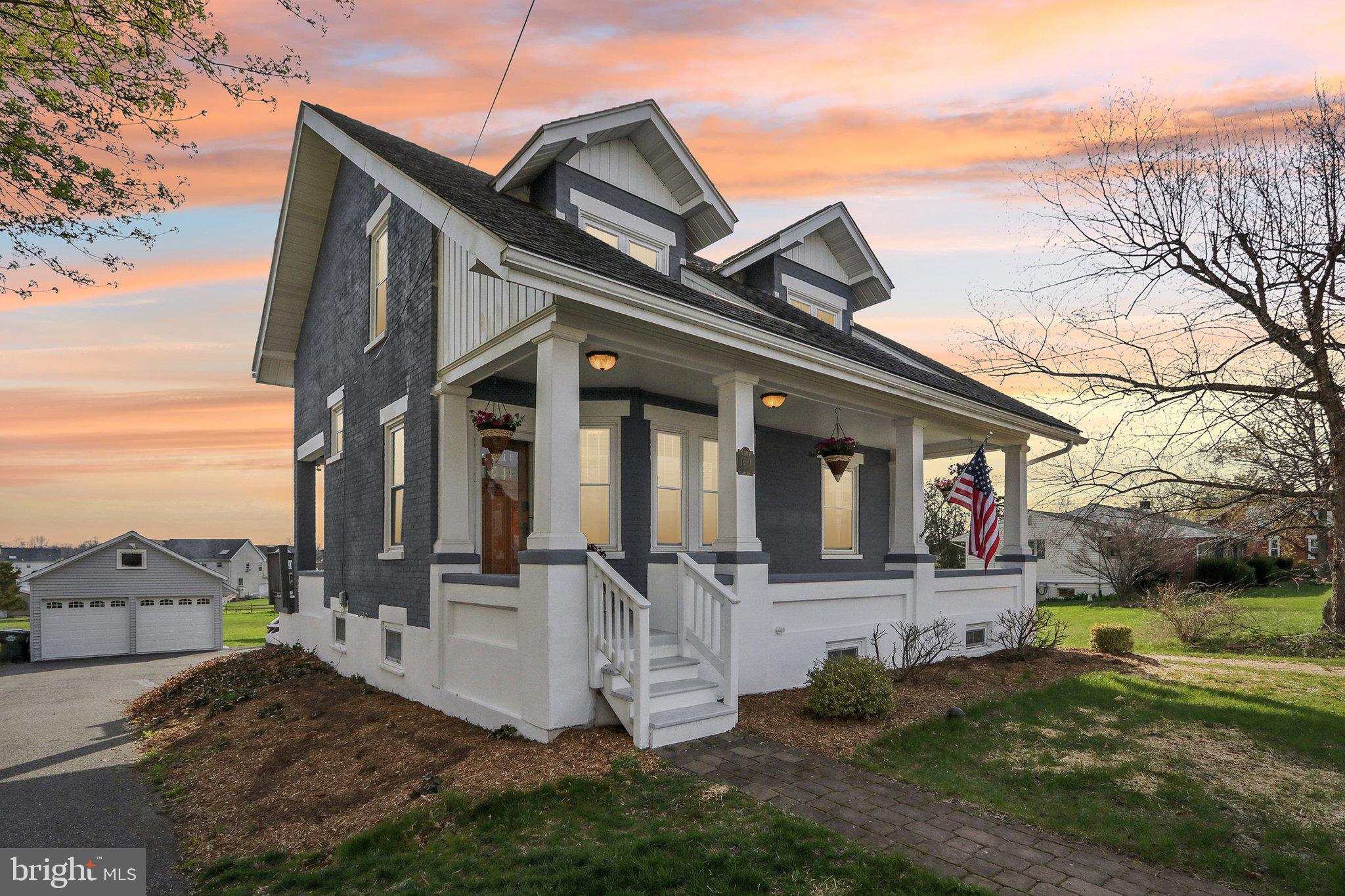 Whether you are looking for historical charm or modern style and convenience, you won’t have to compromise on either. This home perfectly pairs the beauty of historical character and the convenience of smart home design! The built-in bookshelves, hardwood floors, decorative trim, and original stain glass offer charm and warmth while the smart lock entry, automatic window blinds, smart thermostat system, and stainless appliances provide modern convenience. The numerous, large windows provide plenty of natural light throughout the freshly painted rooms. The kitchen boasts smart lighting, instant hot water, and luxury stone countertops, inviting both the novice and gourmet chef alike to enjoy the cooking experience.
The second floor includes 3 generous bedrooms and a spacious bathroom with notable features including an original stain glass transom window, tile floors, and smart lighting. Beautifully finished hardwood floors continue throughout the second-floor hallways and bedrooms. Dormer style windows ensure plenty of natural light in every bedroom.
New systems include central air and furnace units -both less than 3 years old as well as a water softener with smart technology to enable remote monitoring. New windows throughout! The walkout basement offers functionality and accessibility to the laundry and additional storage or bonus space.
For those who appreciate outdoor spaces, this property provides an expansive backyard that is perfect for gardening and outdoor enjoyment. Additionally, the newly refinished front porch, spacious trex deck, and a flagstone patio with a pergola provide plenty of options for outdoor living and entertainment. A 2-car detached garage and shed offer additional storage that completes this incredible property. This home is a true gem that won’t be available for long- come see for yourself!
Open House details listed in additional information.