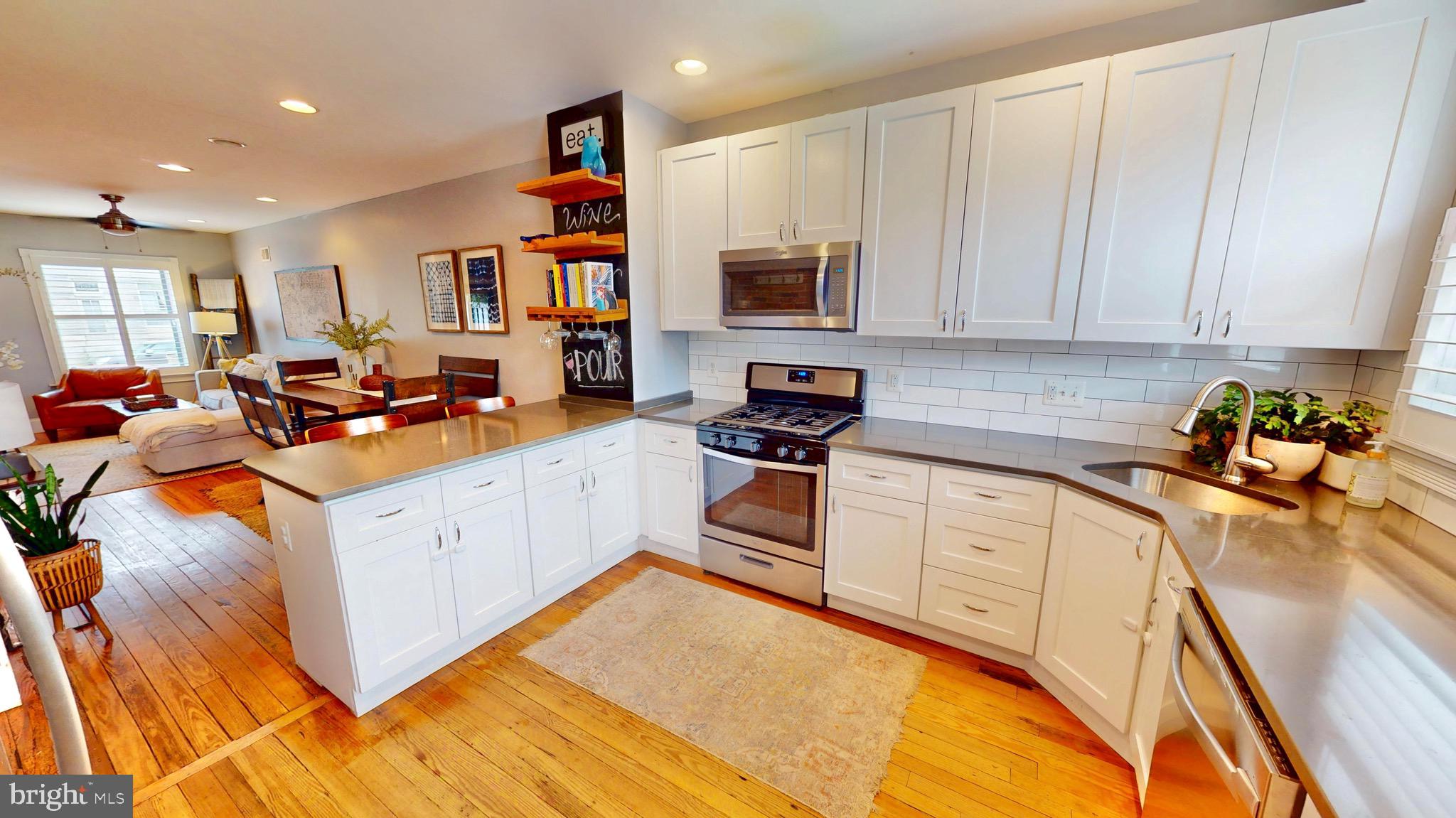 Welcome to 1511 E Fort Ave, a beautifully renovated home just a few houses down from Latrobe Park and right down the street from historic Fort McHenry. With almost two years left on a Historical Tax Credit, this is a rare opportunity to own in one of Baltimore’s most sought-after waterfront neighborhoods.
This tastefully designed 3-bedroom, 3-bath home blends original character with modern amenities. The open floor plan showcases exposed brick throughout, original hardwood floors, and a gourmet kitchen featuring gray quartz counters, white cabinets, subway tile backsplash, and stainless steel appliances! The finished basement offers stained cement floors, adding a sleek, industrial touch, while off-street parking provides an unbeatable convenience in city living.
Outside, the extra-wide sidewalk enhances the home’s curb appeal, and within minutes, you can walk to Harris Teeter, great restaurants, and local shops. Thoughtfully updated and ideally located, this Locust Point gem is the perfect mix of style, comfort, and walkable city living.