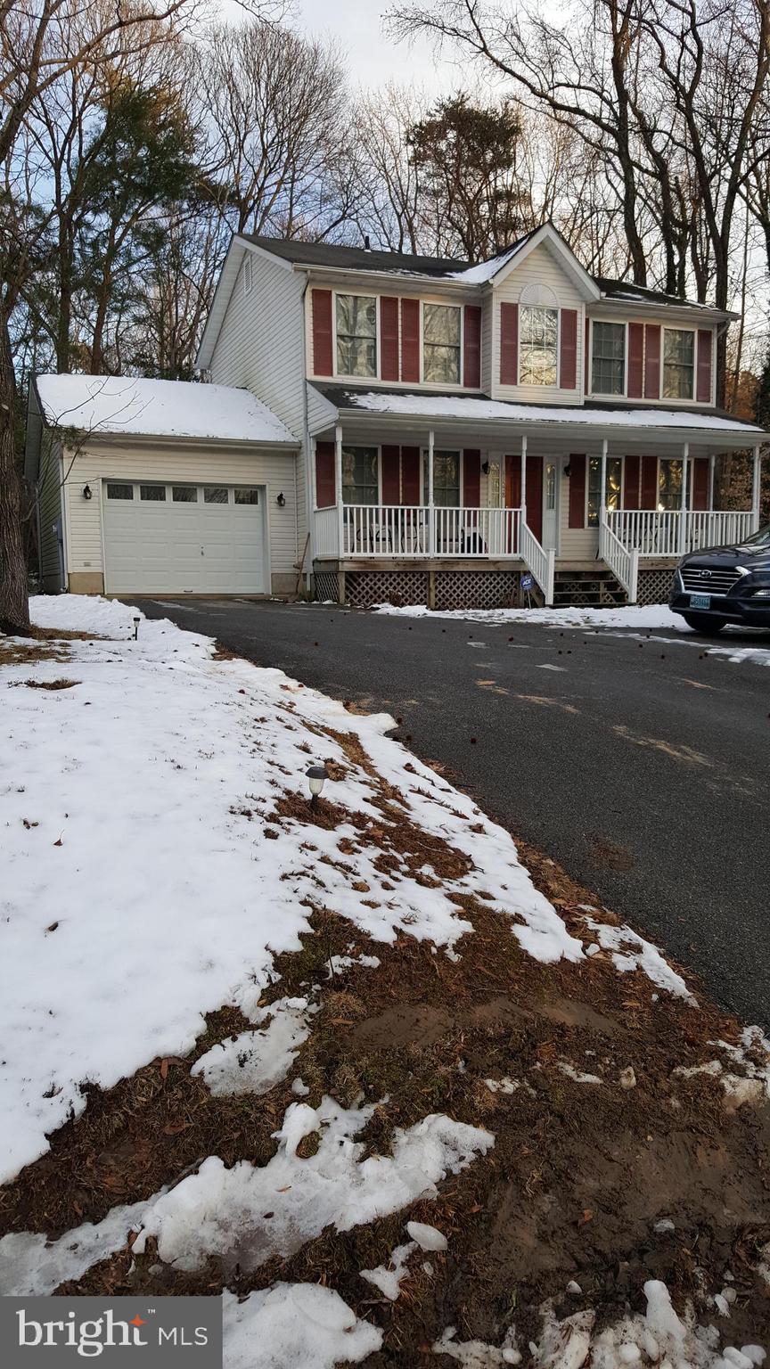 Beautiful 3 Bedroom, 2 & 1/2 Bath Colonial. Close to the old back gate so it's easy to get in and out of CRE from this home. Original owners gave this home lots of TLC . Freshly painted. Useful items that remain will convey if the buyer so desires. Including deck furniture and gas grill. Shelving etc in the garage and even a lawn mower in the shed!