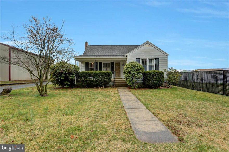 Conveniently located within walking distance to shopping and restaurants, this 3 bedroom is a must see. Enter the living room from the front porch and then into the kitchen which has spacious cabinets for great organization. The rear door from the kitchen goes out to an enclosed rear sun porch. The 3rd bedroom would make a perfect office for remote work as you enter through another room. New flooring and paint through out the home. Detached 2, car garage is located out the rear sunporch door.