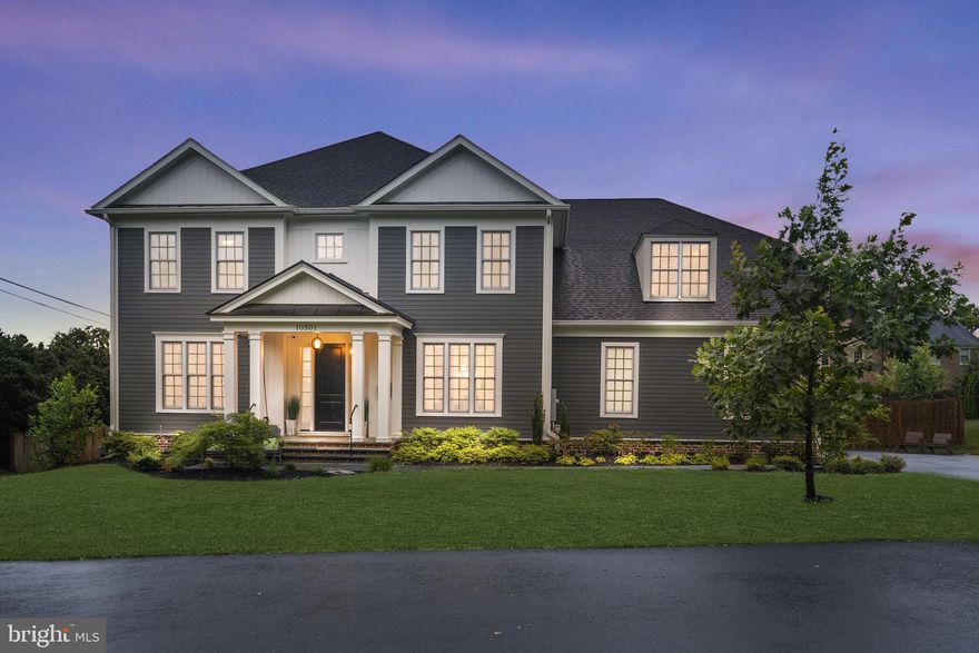 Welcome to luxury living in this grand, custom-designed home filled with architectural details that will wow you at every turn.  This home is filled with natural light and large windows and is perfect for both family living and entertaining.  
 
The front door enters into a wide foyer, flanked by formal living and dining rooms.  All t
he three levels are connected with a beautiful wrap around staircase with hardwood treads and
feature 9-foot ceilings and recessed lighting.  The upper two levels feature beautiful dark hardwood floors and custom crown molding. Chair railings and 8-foot doors add extra elegance to living and dining rooms, front hallway, and butler’s pantry.
 
The gourmet kitchen is an entertainer’s dream with granite countertops and a vast kitchen island that includes a prep sink, built in microwave, and pendant lighting.  White custom cabinetry stretches from floor to ceiling.   Cooks will love the huge pantry, farmhouse sink, and top of the line stainless steel appliances, including a 6-burner gas Thermador range.
 
The open floor plan with clean sight lines from the kitchen to a casual dining space and then on to the family room provides a great communal space for family time and entertaining.  Cozy up in front of the gas fireplace at the end of a long day or watch your favorite sports games with friends on the weekends.
 
The expansive main level office has been roughed in with plumbing so that it can be easily converted into a 6th bedroom with an ensuite bath for main level living.
 
Entrance to the fully finished two-car garage is through a mudroom with cubbies that can be sealed off from the butler’s pantry with a pocket door.  
 
The large backyard is your outdoor oasis, featuring a spacious stone patio and a generous, flat grassy area for play.  A stone buffet anchors one side of the patio with a built in Lion Premium grilled hooked directly to the gas line (no more propane cannisters to change).  The backyard is fully enclosed with a 6-foot privacy fence and ringed with evergreens and Red October maples.    
 
Enjoy a cup of coffee on your front porch finished with flagstones and behold the gorgeous landscaping on your private street. 
 
Rooms on the upper level all branch off a large landing space big enough to be a room all its own. The laundry room is conveniently located on this level with a walk-in linen closet.
 
The massive owner’s suite is large enough for its own sitting area and has his and hers walk-in closets large enough that one can be used as an office or nursery.  The stunning en-suite bath contains breathtaking high-end finishes, such as a frameless glass shower with dual shower heads, soaking tub, dual vanities with marble countertops, full mirrors and chrome fixtures throughout.
 
One upstairs bedroom has its own full bath.  The other two share a bath with twin vanities and a separate room for the bath and toilet.  All three bedrooms contain spacious closets, and one includes a fully-insulated walk-in attic, which can be used as a play room, craft room, or study room with up to three desks.  
 
The lower level recreation room stretches the whole length of the home with room for relaxing on a couch in front of the TV, a game table and gym space. The fifth bedroom is also located on the lower level with a full bath.  The basement features a large unfinished storage room, and a
wide walk-up staircase to the backyard.  
 
This home is conveniently located in the Cobbdale area of Fairfax City, with a half-acre lot.  It is easy walking distance to Pointe 50 and the many restaurants, outdoor concerts and festivals in Old Towne Fairfax. Close proximity to I-66, Route 29, and the Vienna/Fairfax GMU metro station.
 
 
The new owners of this home will be thrilled with how meticulously this home has been kept and cared for.