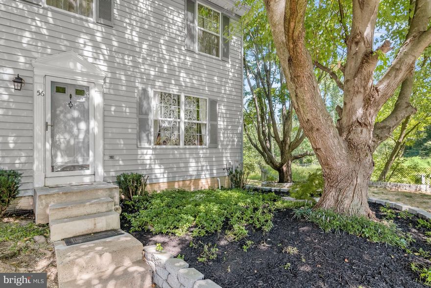 Spacious, end of row townhome backing to woods and located in the Worthington Meadows community of Reisterstown.  This home boasts updated flooring, carpet, and beautifully renovated bathrooms throughout!   The main level begins with the living room leading to a formal dining room detailed with accent molding and stylish wide plank flooring.   You’ll love preparing your favorite meals in the roomy, eat-in kitchen that features a breakfast nook, center island, ample counter space, tile flooring and stainless appliances that include an electric glass top range and French door refrigerator with a water dispenser and icemaker, and access to the deck.   Ascend the staircase to the primary bedroom with its own full bath, two sizable bedrooms and a hall bath completing this level.  The lower level provides a large storage room, a powder room renovated with a beadboard accent wall and stylish tile flooring, and a family room with a cozy fireplace and walkout to the shaded patio and backyard.    Enjoy outdoor living on the expansive deck under the custom pergola with serene, wooded views.