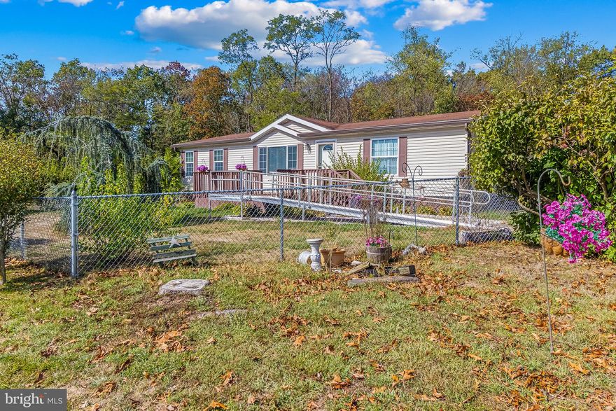 ✨ Welcome home! Sitting on nearly 3 acres with NO HOA, this property offers the freedom you’ve been searching for. From the inviting front porch with breathtaking mountain views to the side porch with a covered sitting area, it’s the perfect blend of comfort, privacy, and outdoor living.
Inside, you’ll find a spacious layout featuring a cozy pellet fireplace, a separate laundry/mudroom, and a wheelchair-accessible front entrance for added convenience. The primary suite boasts an accessible shower, making daily living effortless.
Upgrades include a newer washer, dryer, dishwasher,  and refrigerator. Step outside to enjoy a fenced front yard, a two parking spot carport, a shed, and a large workshop with endless possibilities – whether it’s hobbies, storage, or creating the dream space you’ve always wanted.
Lovingly cared for and move-in ready, this home offers acreage, views, and no HOA – opportunities like this don’t come around often. Schedule your showing today and fall in love with mountain living! 🏡🌄

Septic pumped in January 2024.