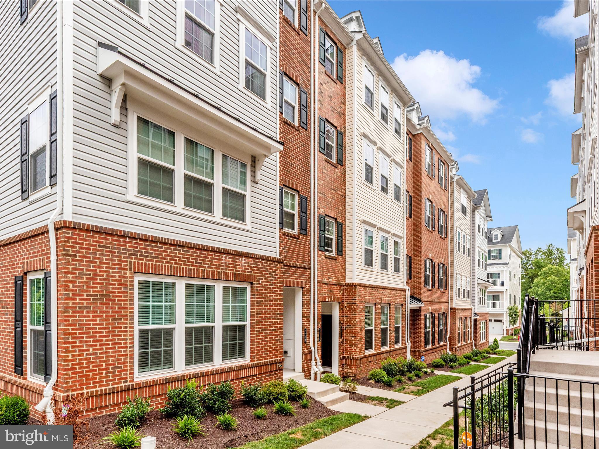🏡 Welcome to 9374 Seney Lane. Your Modern Retreat in the Heart of Owings Mills! This beautifully maintained 'like new' 3-bedroom, 2.5-bath townhome offers the perfect blend of modern style, comfort, and convenience. The open-concept main level features tall ceilings, gleaming hardwood floors, and a stunning gourmet kitchen complete with granite countertops, elegant pendant lighting over the island, stainless steel appliances, and ample cabinet space, perfect for everyday living or entertaining. Upstairs, enjoy a spacious primary suite with a spa-like ensuite bath, double vanities and a large walk-in closet. The upper level also includes two additional bedrooms, a full bath, and a convenient laundry area. Step outside to your private patio, a great space for relaxing or just catching a breeze. 🎁 Bonus: The seller is offering a 1-year home warranty and the custom faux wood blinds throughout the home! 📍 Located just minutes from Mill Station and Foundry Row, you'll have Wegmans, LA Fitness, HomeGoods, and endless dining and shopping options at your fingertips, plus the AMC Owings Mills 17 movie theater. The community features top-tier amenities including a clubhouse, fitness center, swimming pool, walking trails, picnic area, and playground. Lyons Mill Elementary School is just a short walk away, and you’ll enjoy easy access to downtown Baltimore and major commuter routes. Schedule your private showing today and make 9374 Seney Lane your new Home Sweet Home!