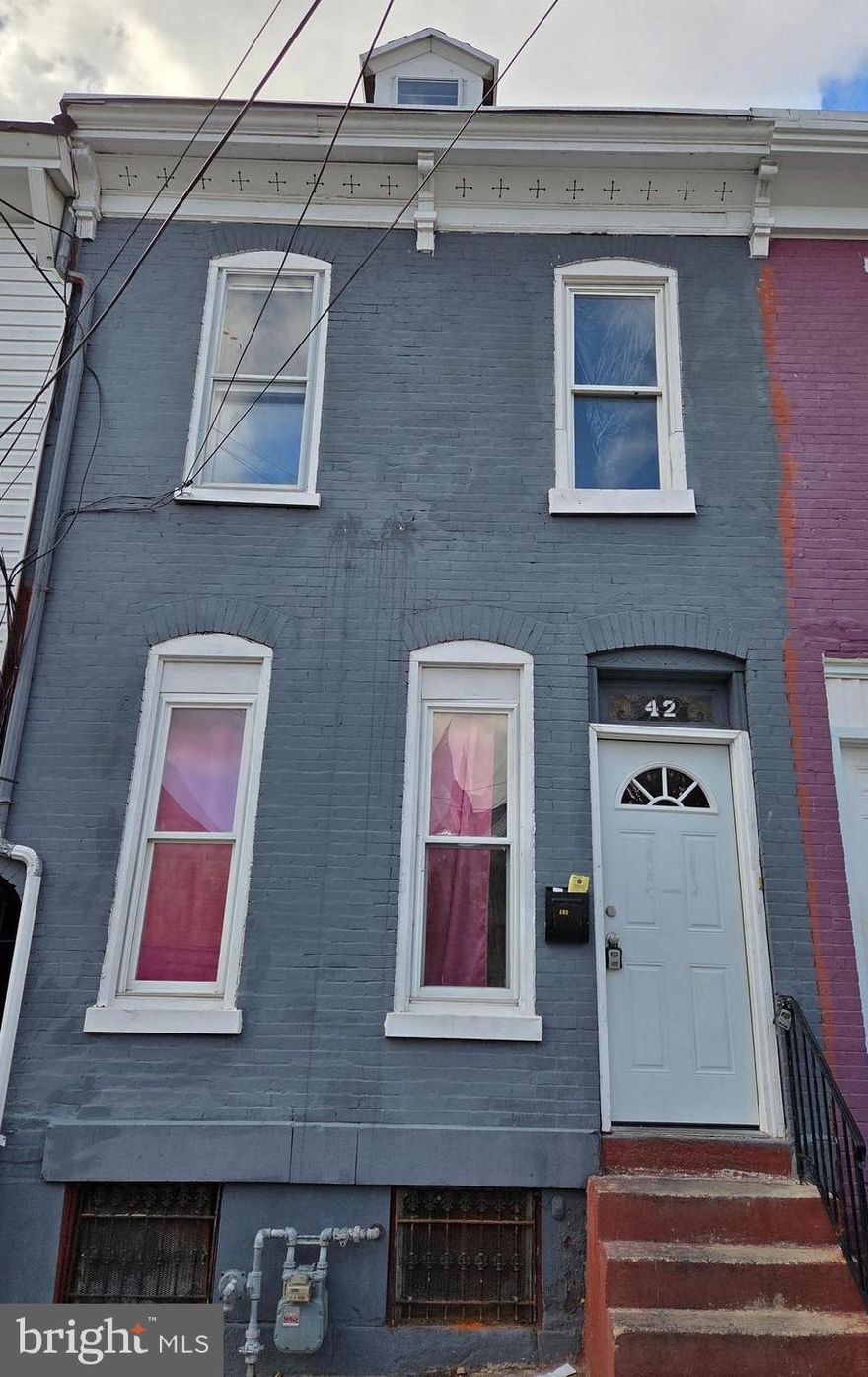 New Price Adjustment — Fantastic Opportunity on 42 Maple St! ✨
Welcome to 42 Maple Street in Reading City! Just steps from City Park and Penn Street, this roomy 4-bedroom, 1-bath home offers incredible value and plenty of space for comfortable living.

Step inside to a bright and spacious living room and dining room, both featuring attractive laminate wood flooring. The kitchen and dining room each offer direct access to the fenced-in yard—perfect for outdoor enjoyment, pets, or a private garden space.

The second floor includes three well-sized bedrooms, the main bathroom, and a versatile bonus area that works wonderfully as a walk-in closet, playroom, or home office. The third floor features a large fourth bedroom with great privacy and flexibility.

With gas heat, gas hot water, and only a few minor finishing touches needed, this home is full of potential and ready for its next owner.

Don’t miss out on this great opportunity at its new price—schedule your tour today!