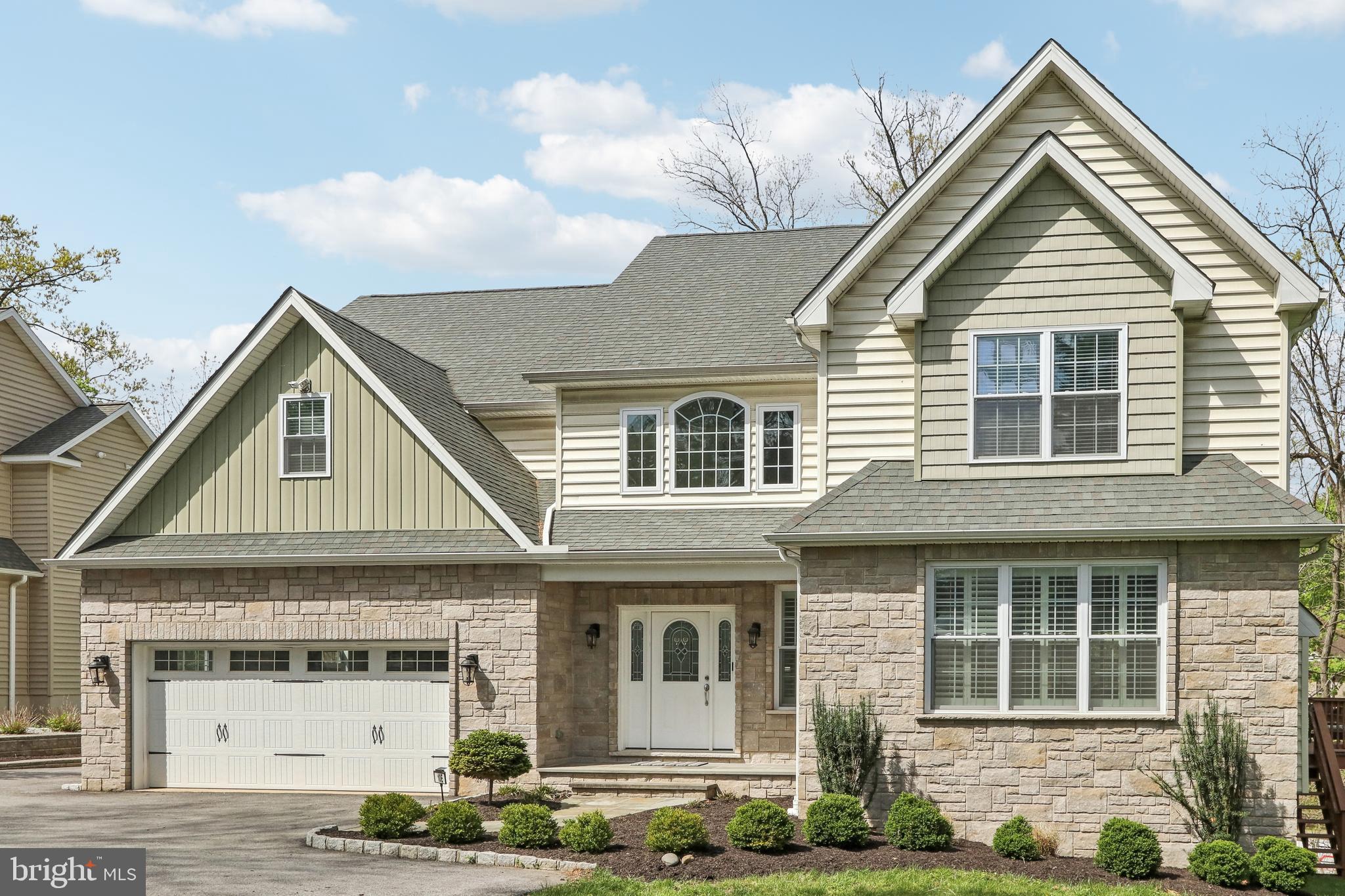 Get ready to fall in love with 10 E Central Ave. in Paoli — where newer construction, modern style, and unbeatable location come together! This bright, move-in ready home features an open floor plan with fresh neutral tones and spaces designed for today’s living. Enjoy cozy winter evenings in front of the fireplace in the large Living Room and meals in the spacious Dining Area. The main level flows seamlessly out to a private Deck, which overlooks serene wooded open space and a spacious yard — perfect for outdoor entertaining, recreation, and gardening. The large Kitchen features an expansive island, stainless frig, gas cooktop with exhaust hood, and double wall ovens. An undercounter beverage refrigerator is great for enteraining. A large Mudroom off the 2-car Garage has cubbies and a Half BA. Enjoy hobbies or working from home in the secluded Office/Study/Music Room, which could also be used as a Guest Bedroom.
Upstairs, you’ll find four generous bedrooms, including a Primary Bedroom Suite with a luxurious Bathroom with a freestanding tub and separate shower. The 2nd Bedroom features its own en suite Full Bathroom, ideal for guests or teens, plus a versatile Office/Bonus Room for working from home or creating a cozy retreat. Two additional Bedrooms share a 3rd Full Bathroom, and the convenient upstairs Laundry Room makes everyday living a breeze.
The walkout Lower Level offers even more flexible space, complete with a daylight-filled recreation area, a 2nd Powder Room, and easy access right out to the backyard. All this, plus top-ranked Tredyffrin-Easttown Schools, and just minutes to the Paoli train station, shops, and dining! This approx. 4,649 s.f. home (including the finished LL) is stylish, spacious, and set in a convenient location — Showings start Wed. April 30th... schedule your appt. today!