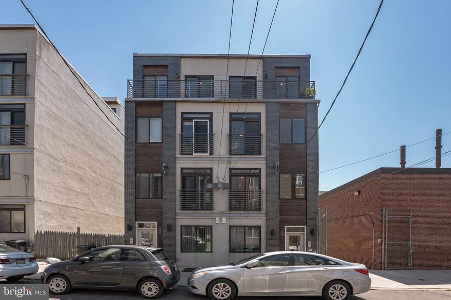 Welcome to 837 N 16th St Unit 3. This wonderful condo is located in the heart of exciting Francisville where new construction and home renovations abound. This flourishing area offers all the amenities you would expect from the Philly urban lifestyle. Fantastic eateries and venues are just steps away in this extremely walkable neighborhood. This central location in Fancisville is only a few blocks from the Fairmount Ave corridor, Broad St and is just east of the extremely desirable Fairmount neighborhood. Center City, many other appealing Philly neighborhoods, easy transportation, and rich green spaces are close by. The facade is a unique combination of  brick, cedar siding and smooth stucco in a design that provides a modern feel to the Philly row home style. Enter the unit and you will be impressed with the flood of natural light and the warm stranded bamboo flooring throughout the living area into the custom kitchen. The kitchen offers a great space with beautiful solid door cabinets and quartz counter-tops complimented by a clean yet stylish glass tile back-splash, complete with state-of-the-art stainless steel appliances. Take the sleek and modern staircase up to the second level, comprising a great sized bedroom, a tastefully designed full bathroom along with the laundry area. Continuing to the third level, here you will find the master suite with yet another very well appointed bedroom and the beautiful second full bathroom along with a small private balcony. Next you will make your way to the roof top deck where breathtaking skyline views of Philadelphia awaits.