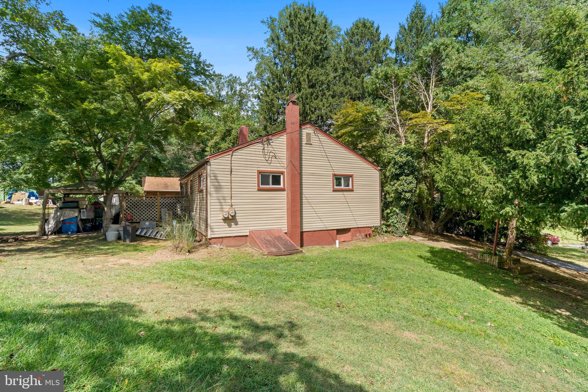 Nestled on a serene, tree-lined street in Malvern, PA, this inviting ranch-style home at 52 Carol Ln presents a wonderful blend of comfort, privacy, and untapped potential. Featuring 3 bedrooms, 1 full bath, and 1 half bath, along with a semi-finished basement that offers versatile additional space for a home office, recreation area, or extra storage, this property is set on an expansive 1.08-acre lot enveloped by lush greenery—providing the peaceful escape you've been seeking while staying conveniently near local shops, dining, and transportation.
Step inside to find a welcoming interior with classic wood paneling, hardwood floors, and plenty of natural light pouring through the windows, creating a cozy atmosphere ready for immediate enjoyment. The layout flows naturally, offering room to live as-is or customize to your preferences. Outside, the detached 2-car garage and ample driveway ensure convenient parking and storage, while the backyard beckons for gatherings, gardening, or quiet relaxation. A deck complete with a hot tub enhances the outdoor appeal, and the wooded surroundings amplify the sense of seclusion.
Ideal for families, this home is situated in the highly regarded Great Valley School District, renowned for its strong educational offerings. Whether you're drawn to its current charm for a move-in-ready lifestyle or envision endless possibilities through thoughtful updates—like refreshing the spaces or expanding outdoor features—this property's solid structure and prime location make it a compelling option. Picture settling in effortlessly or crafting your personalized haven on this generous acre-plus parcel, where privacy meets opportunity.
All information is deemed reliable but not guaranteed. Buyers should verify details independently. Property is sold as-is.