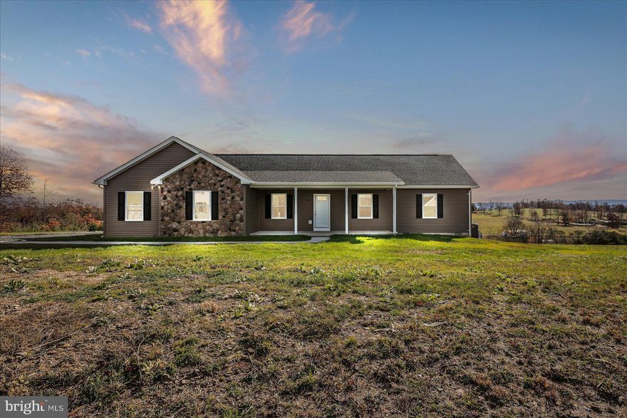 BACK ON MARKET DUE TO NO FAULT OF SELLER. Second chance to make it your own!!
Welcome to your dream ranch-style home just outside Frederick County, VA! This magnificent three-bedroom, two-bathroom residence boasts a thoughtfully designed  floor plan. The spacious primary bedroom, complete with an en suite bathroom and large walk in closet offers privacy and comfort, while two guest bedrooms and a full bath are situated on the opposite side, perfect for family and guests.

Enjoy ample living space in the open-concept kitchen, living, and dining area, ideal for entertaining or relaxing. Step outside to the expansive deck, where breathtaking views create a serene backdrop for outdoor living. With an oversized two car garage you will have plenty of room for storage and vehicles.
 Please schedule a showing to see this beautiful home in person.